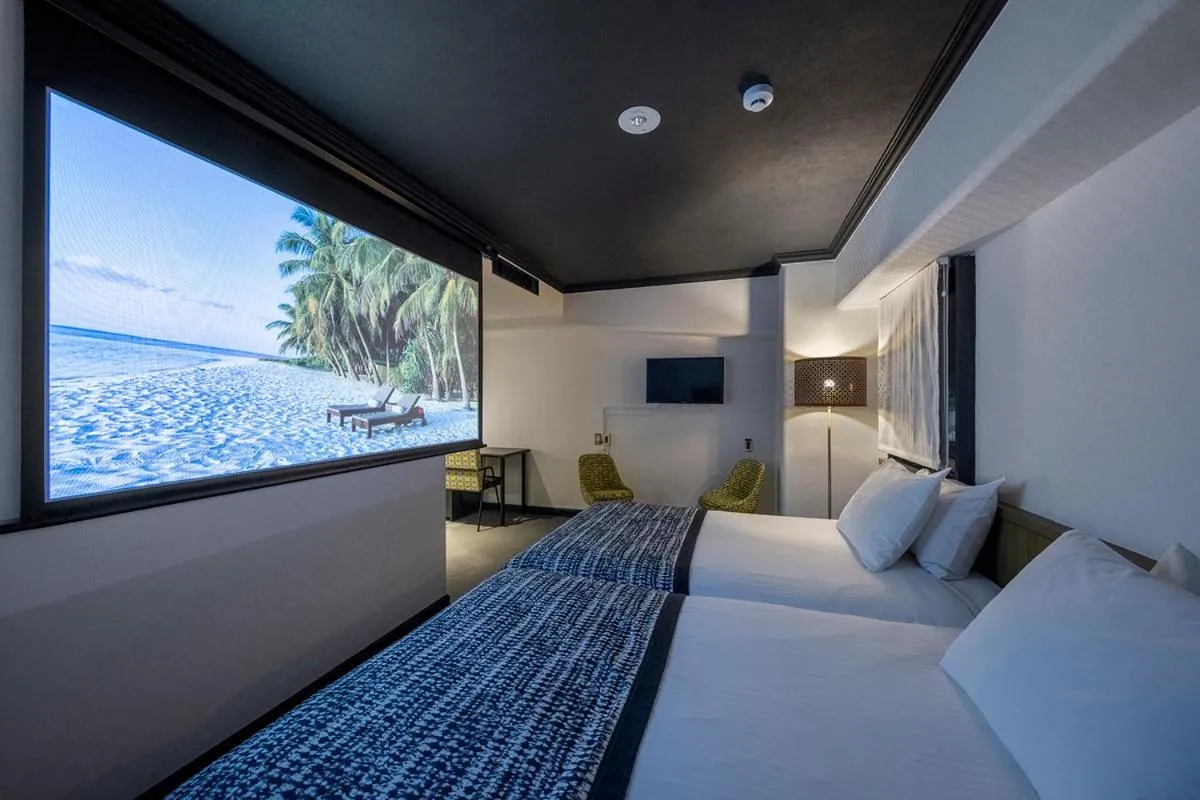 Bed in Estinate Hotel Naha