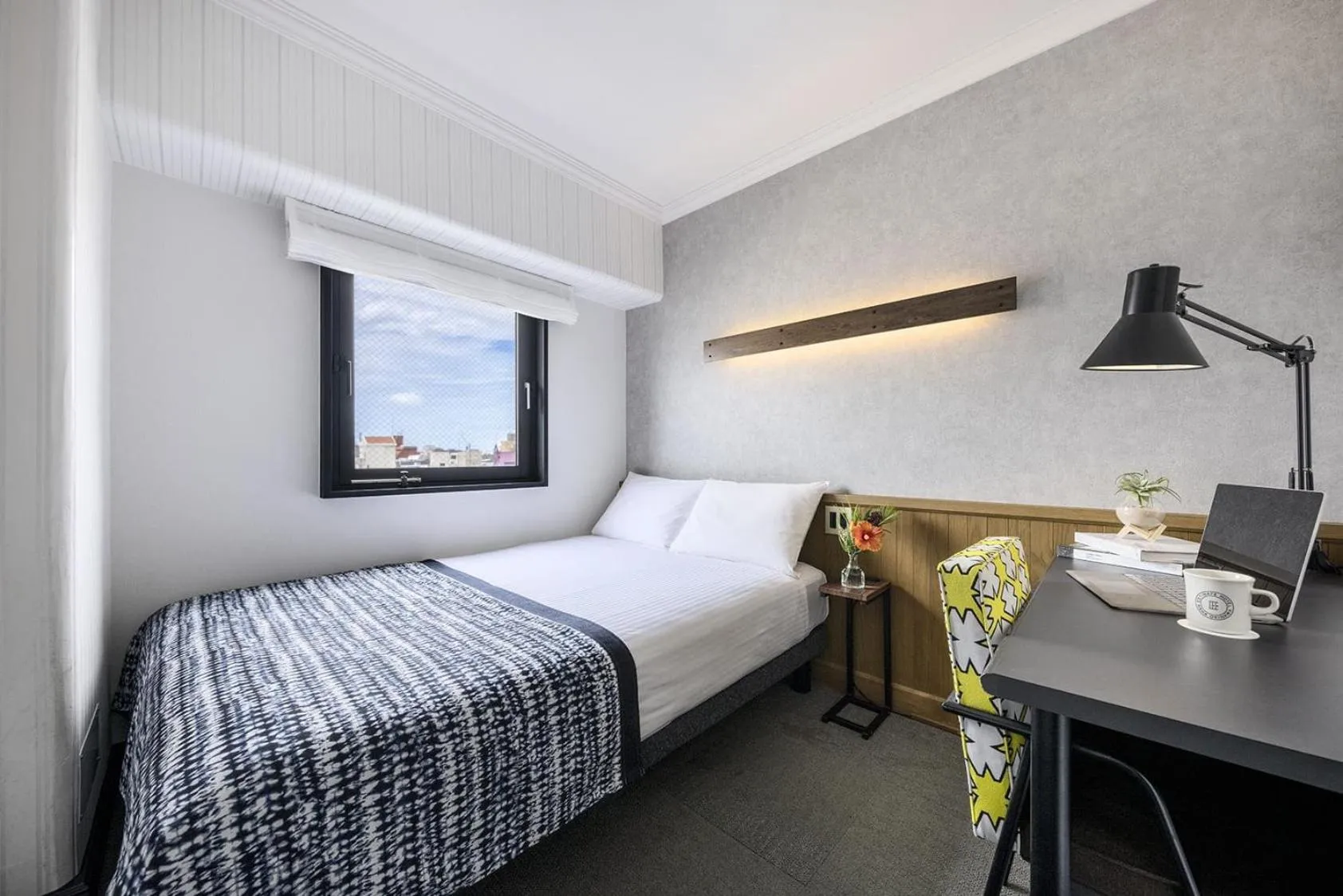 Bed in Estinate Hotel Naha