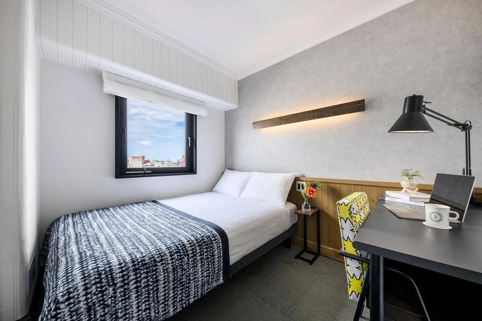 Bed in Estinate Hotel Naha