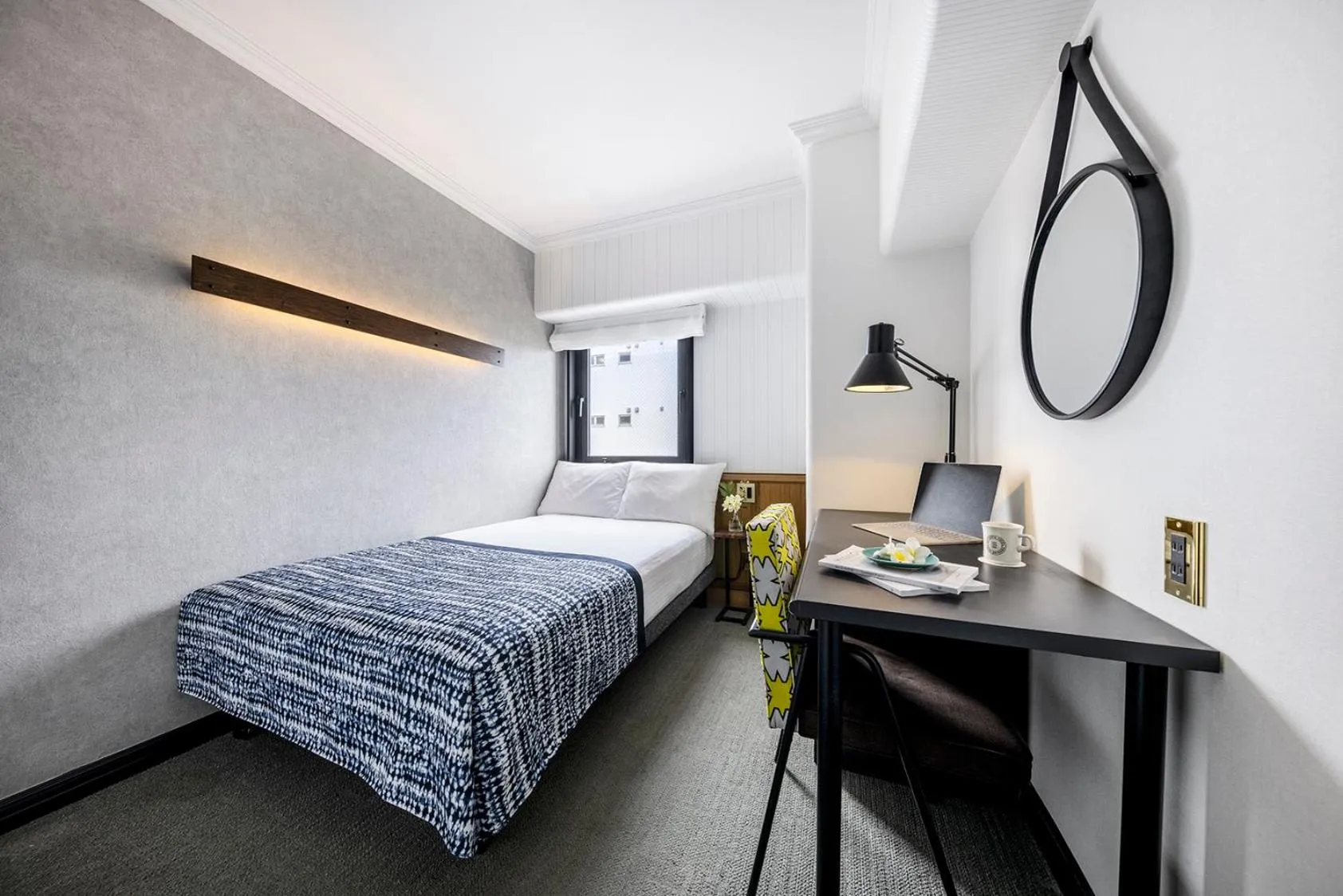 Bed in Estinate Hotel Naha