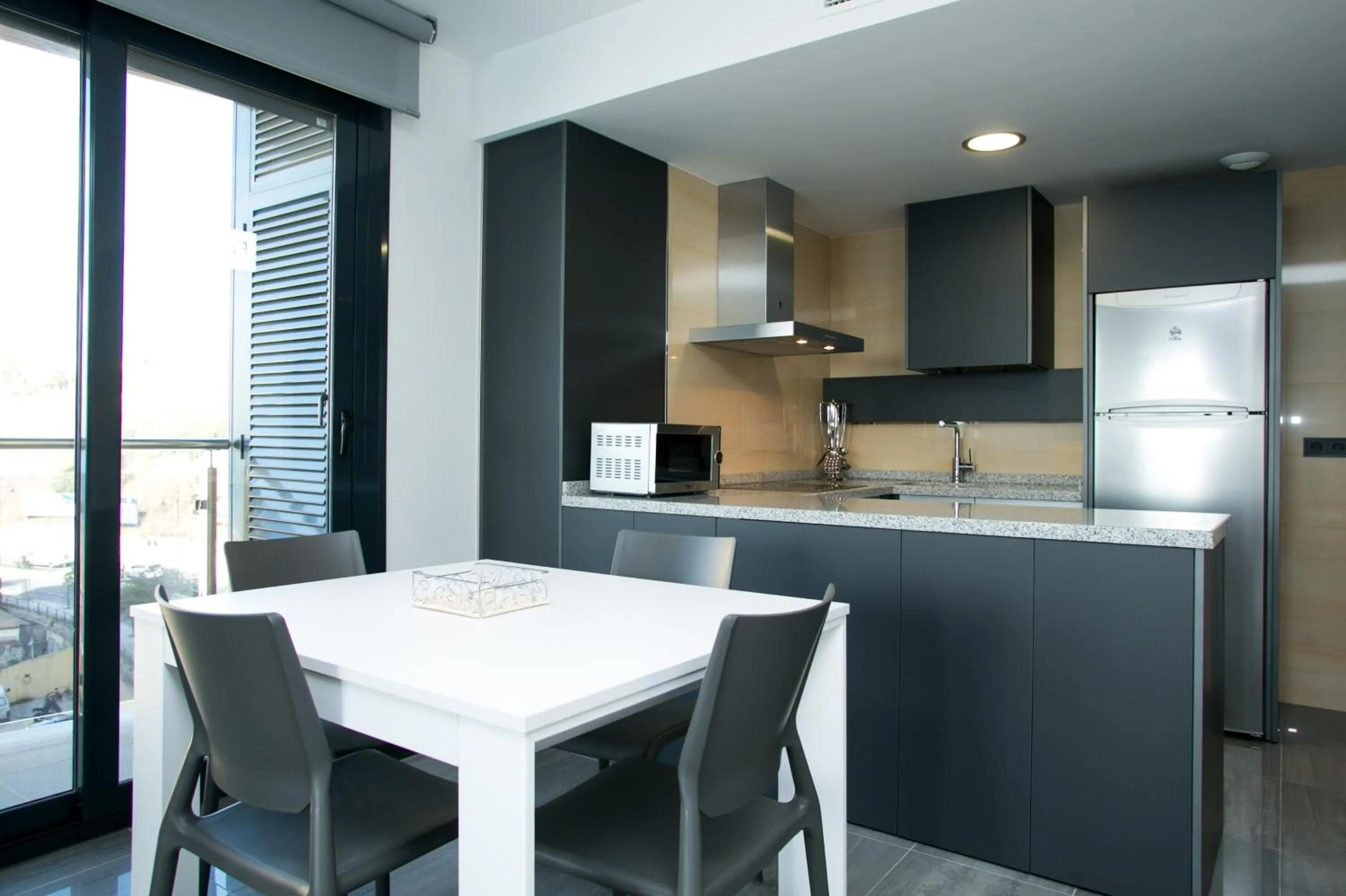 Kitchen or kitchenette in Apartamentos Fuengirola Playa