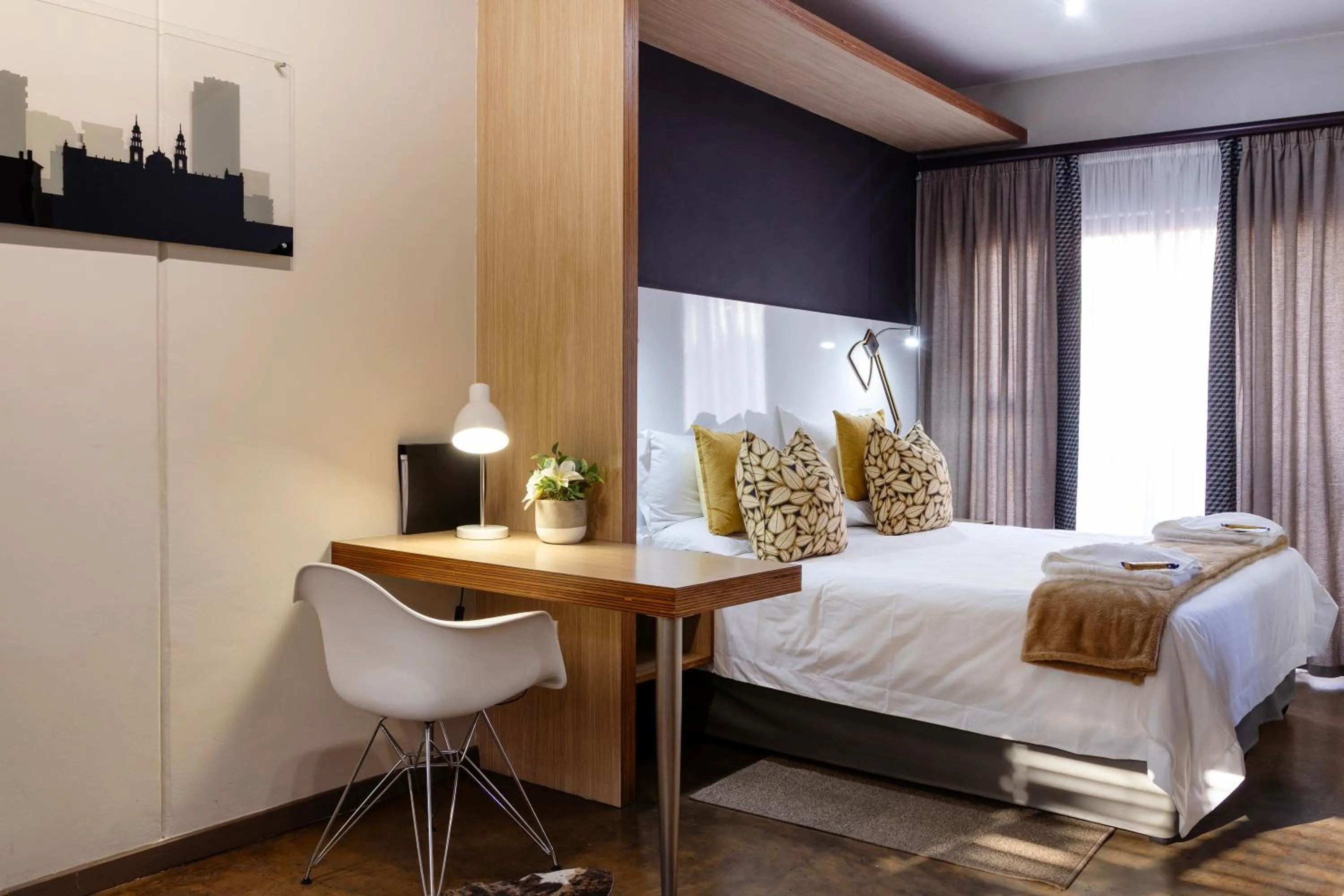 Bed in Akanani Apartments