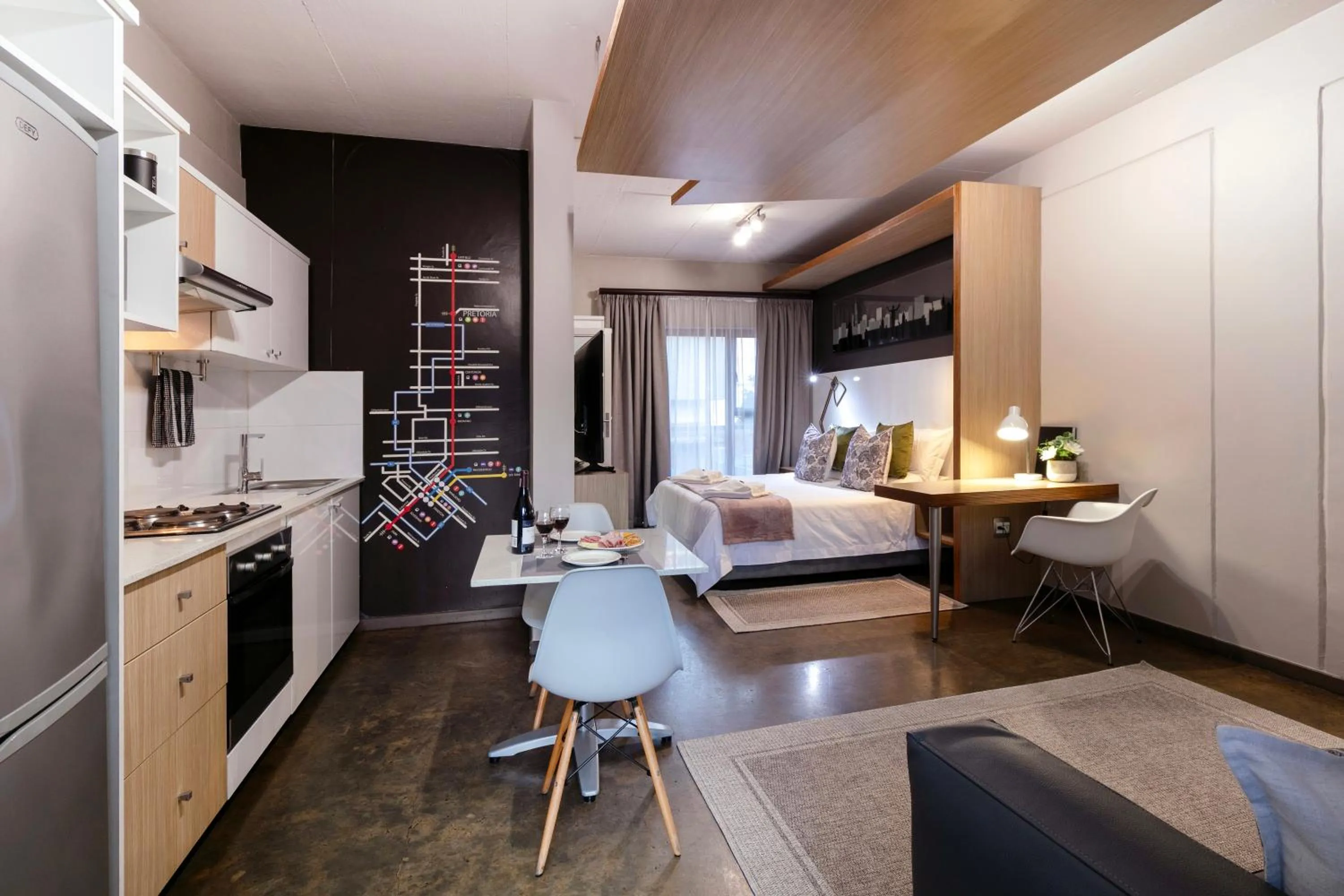 Bed in Akanani Apartments