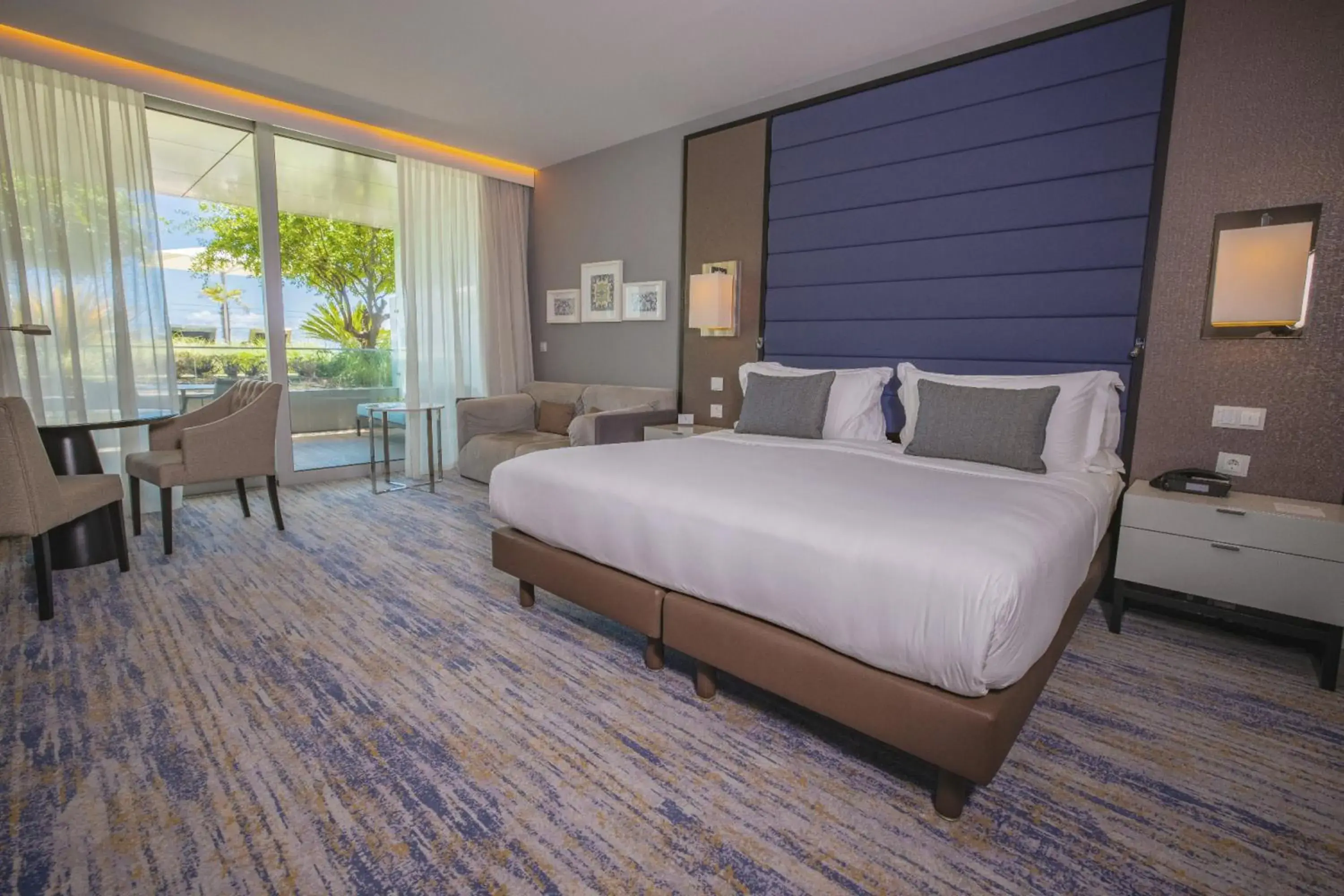Garden view, Bed in InterContinental Cascais-Estoril by IHG Garden view, Bed in InterContinental Cascais-Estoril by IHG