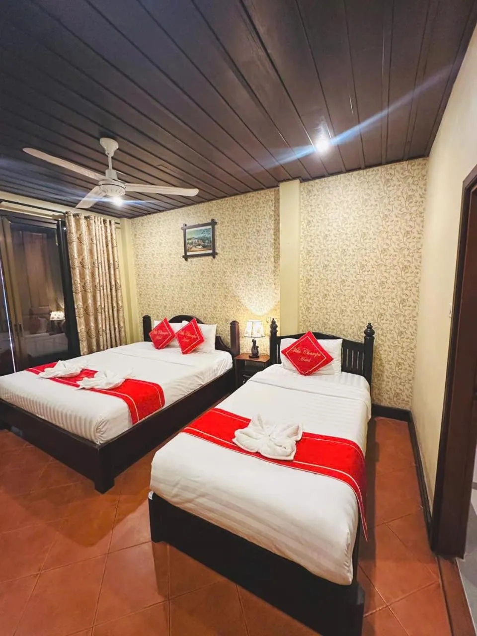 Bed in Luang Prabang Champa Villa Hotel