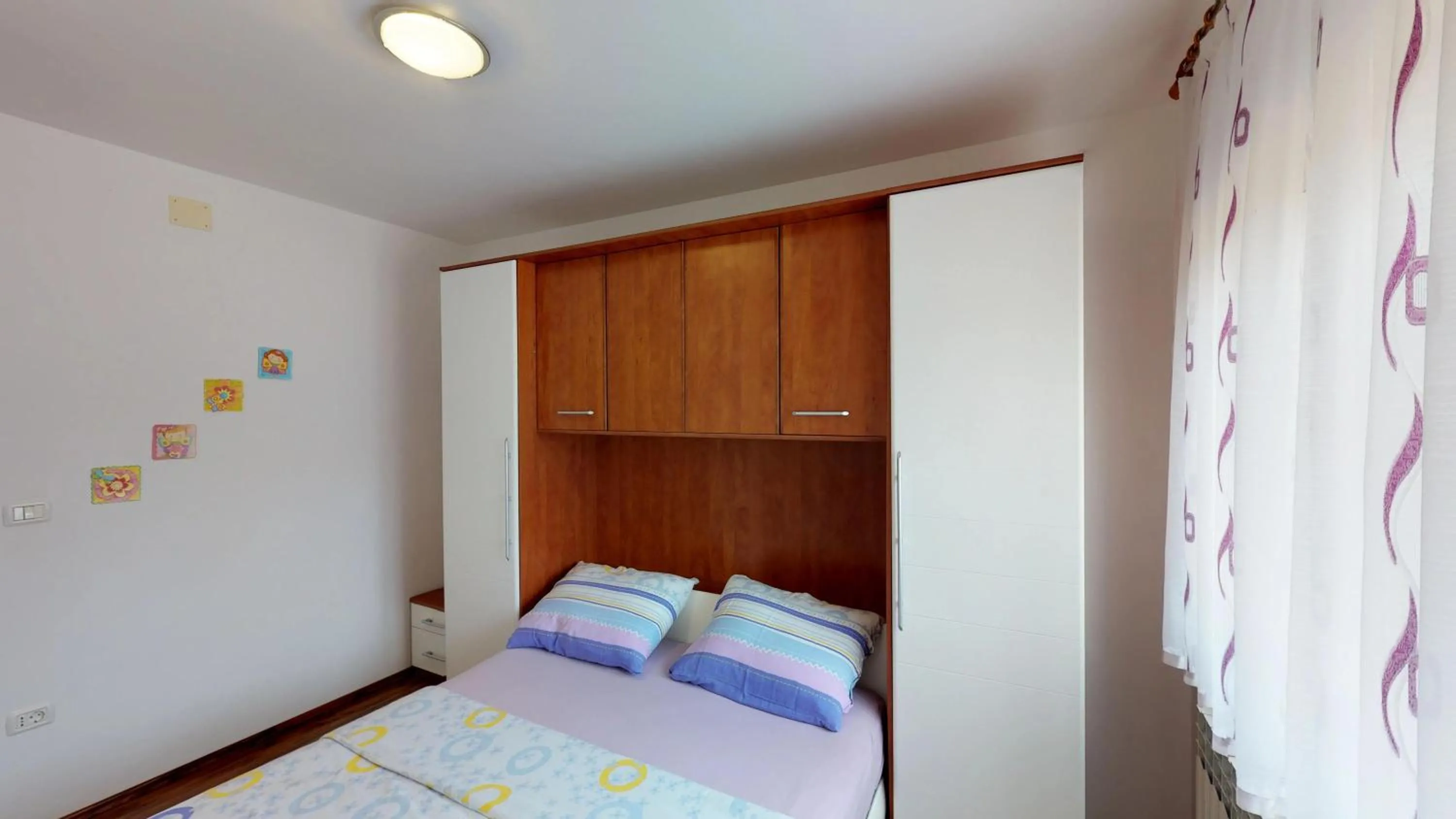 Bed in Apartments Goga