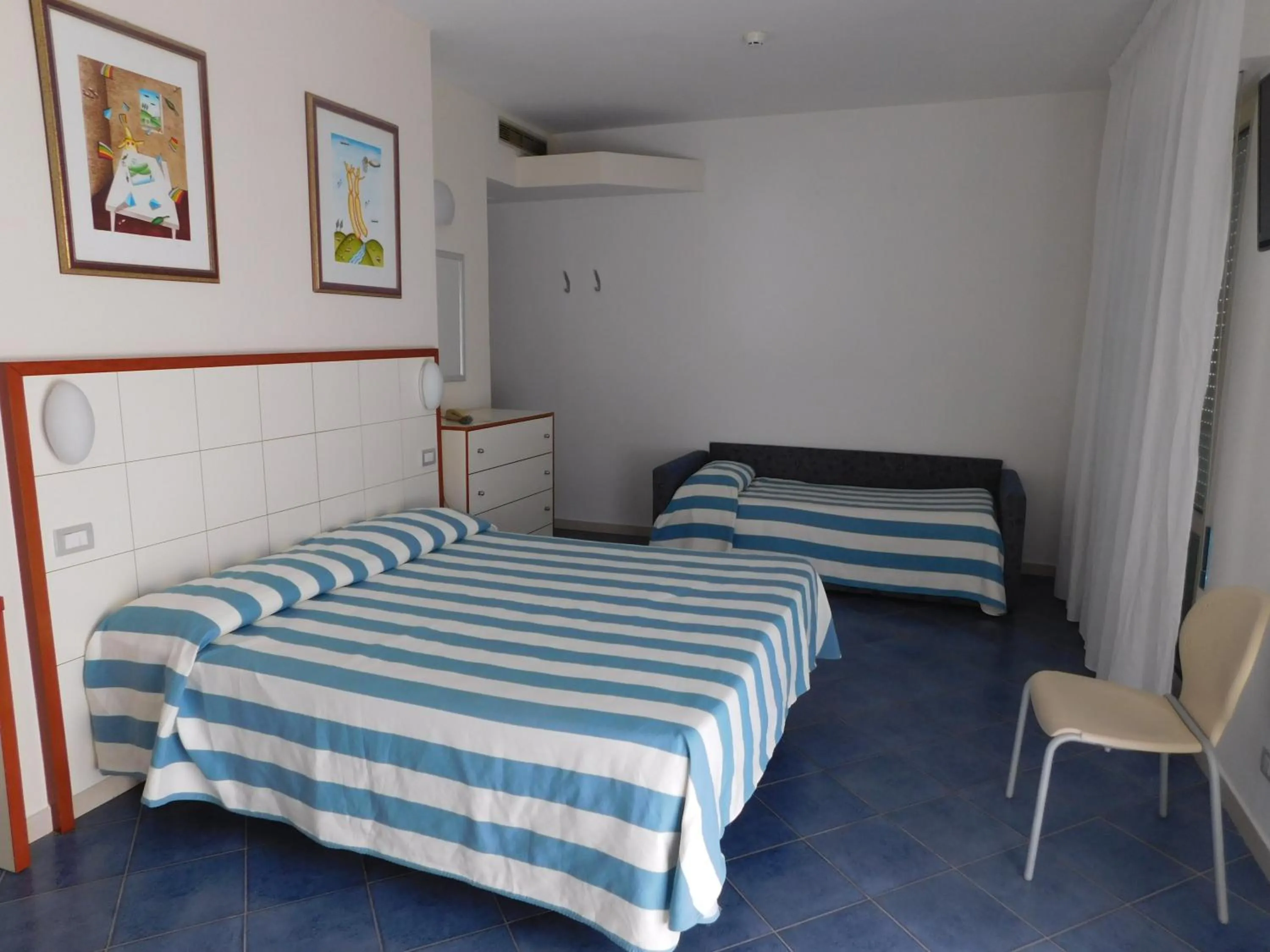 Property building, Bed in Hotel Oceano