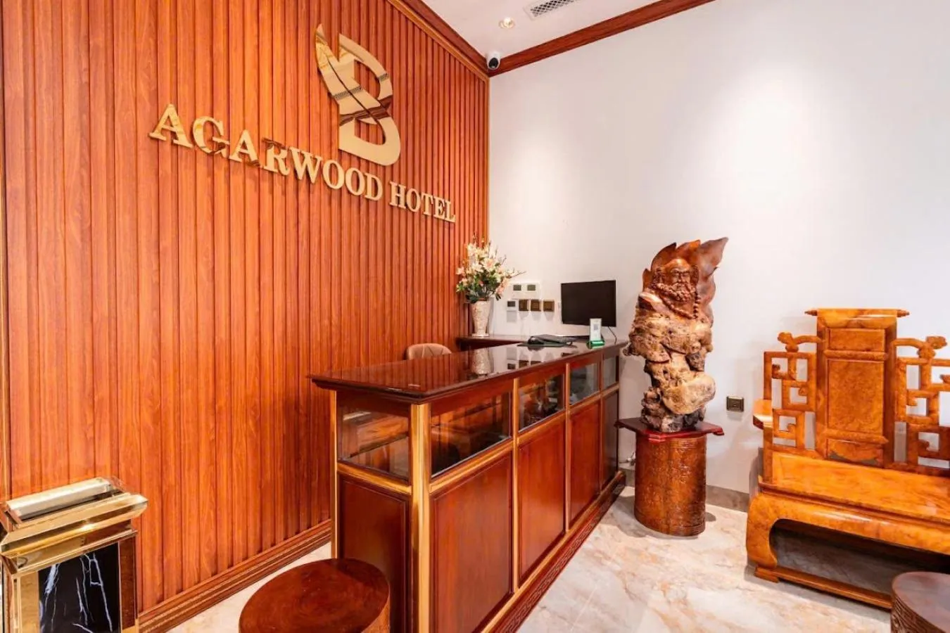 Communal lounge/ TV room in Agarwood Hotel