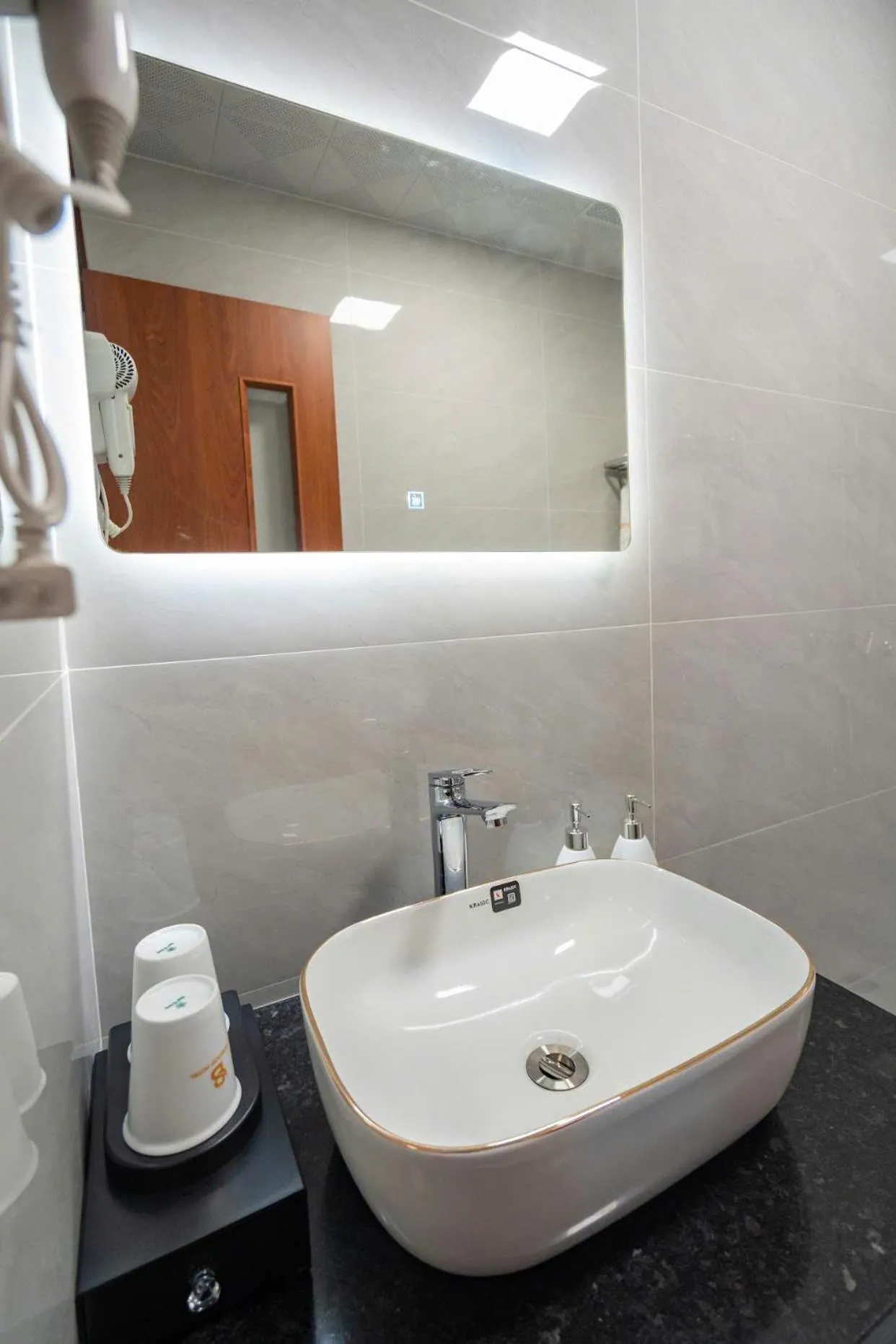 Bathroom in Agarwood Hotel