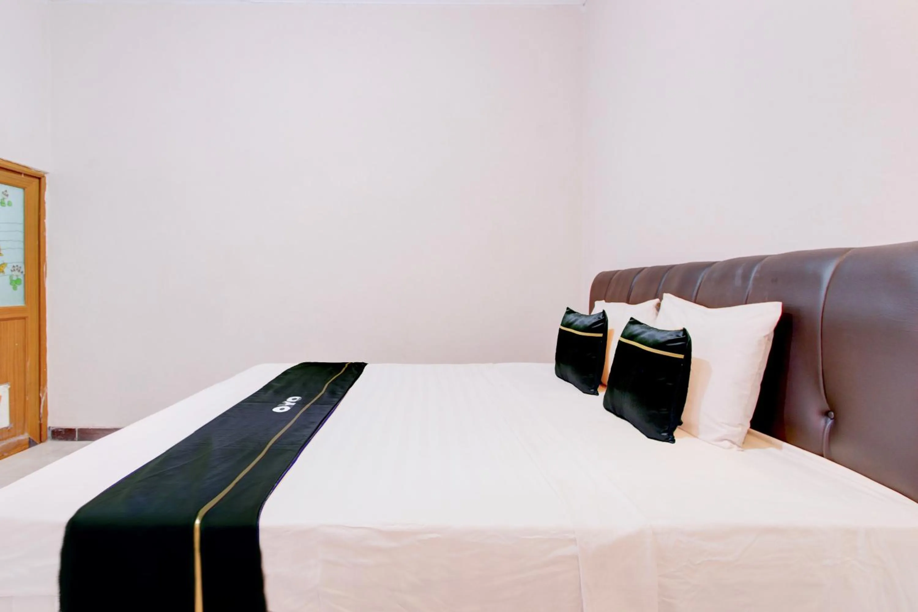 Bed in SPOT ON Podomoro Homestay