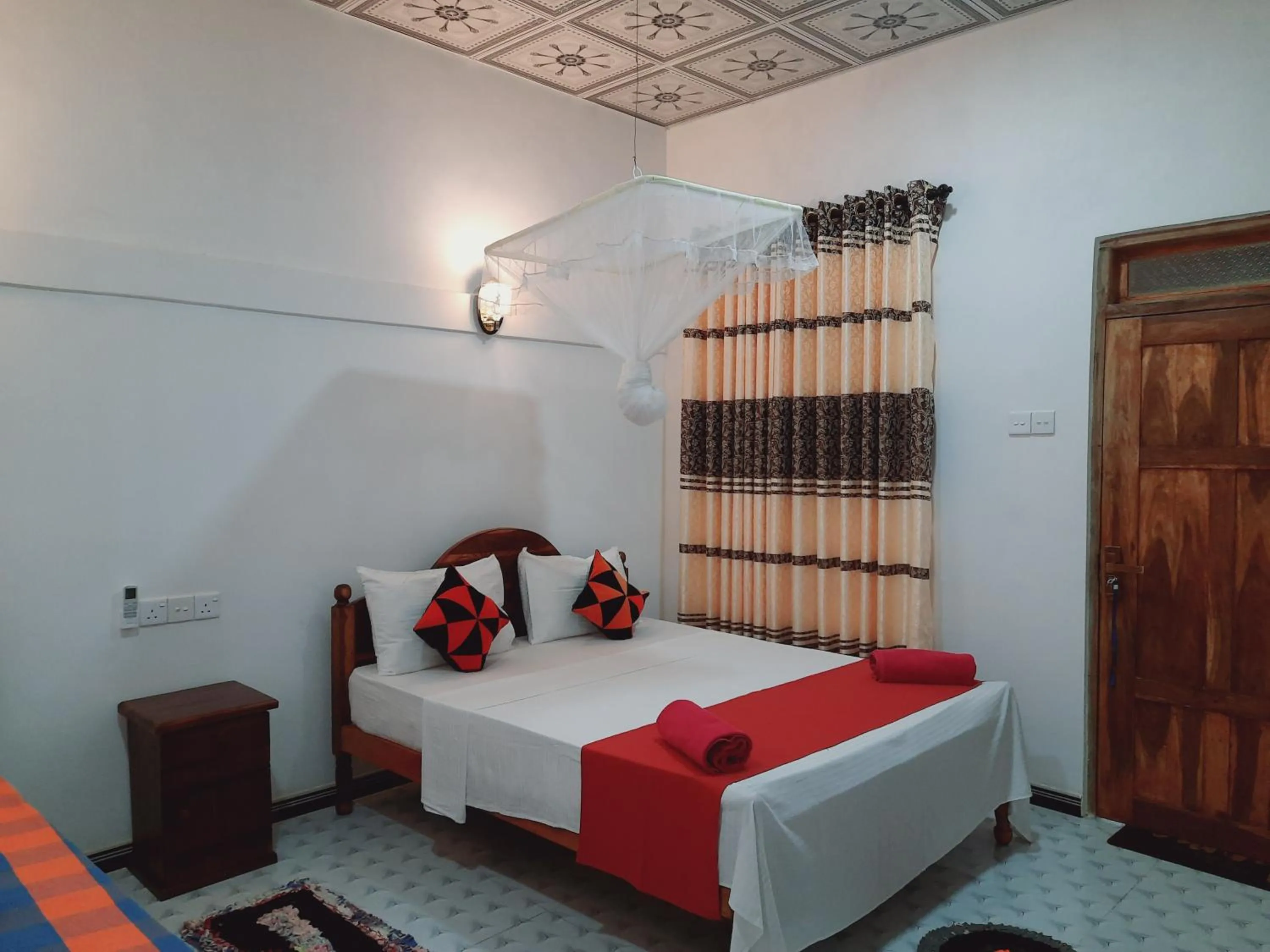 Bed in Sigiri Dasa Home stay