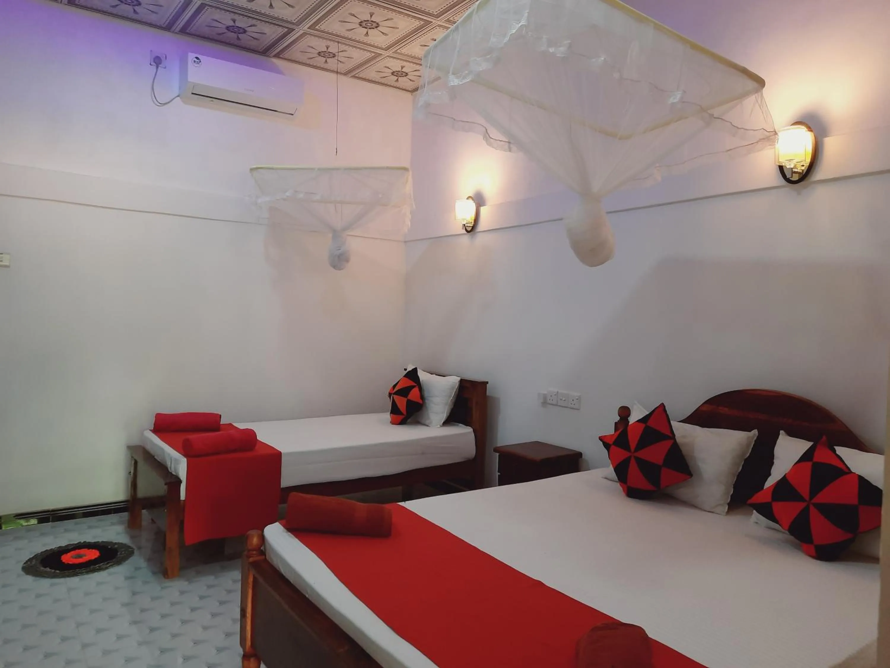 Bed in Sigiri Dasa Home stay