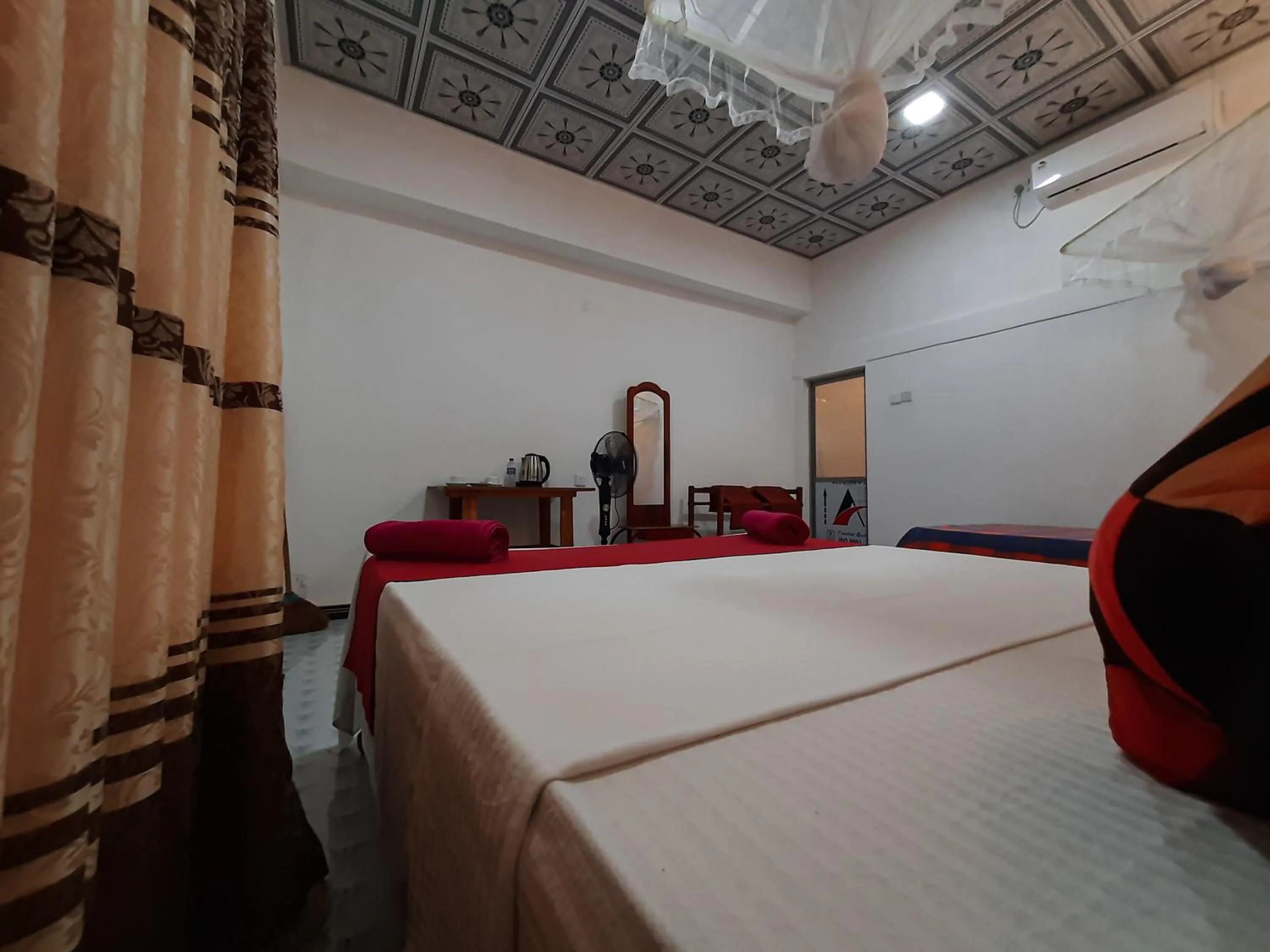 Bed in Sigiri Dasa Home stay