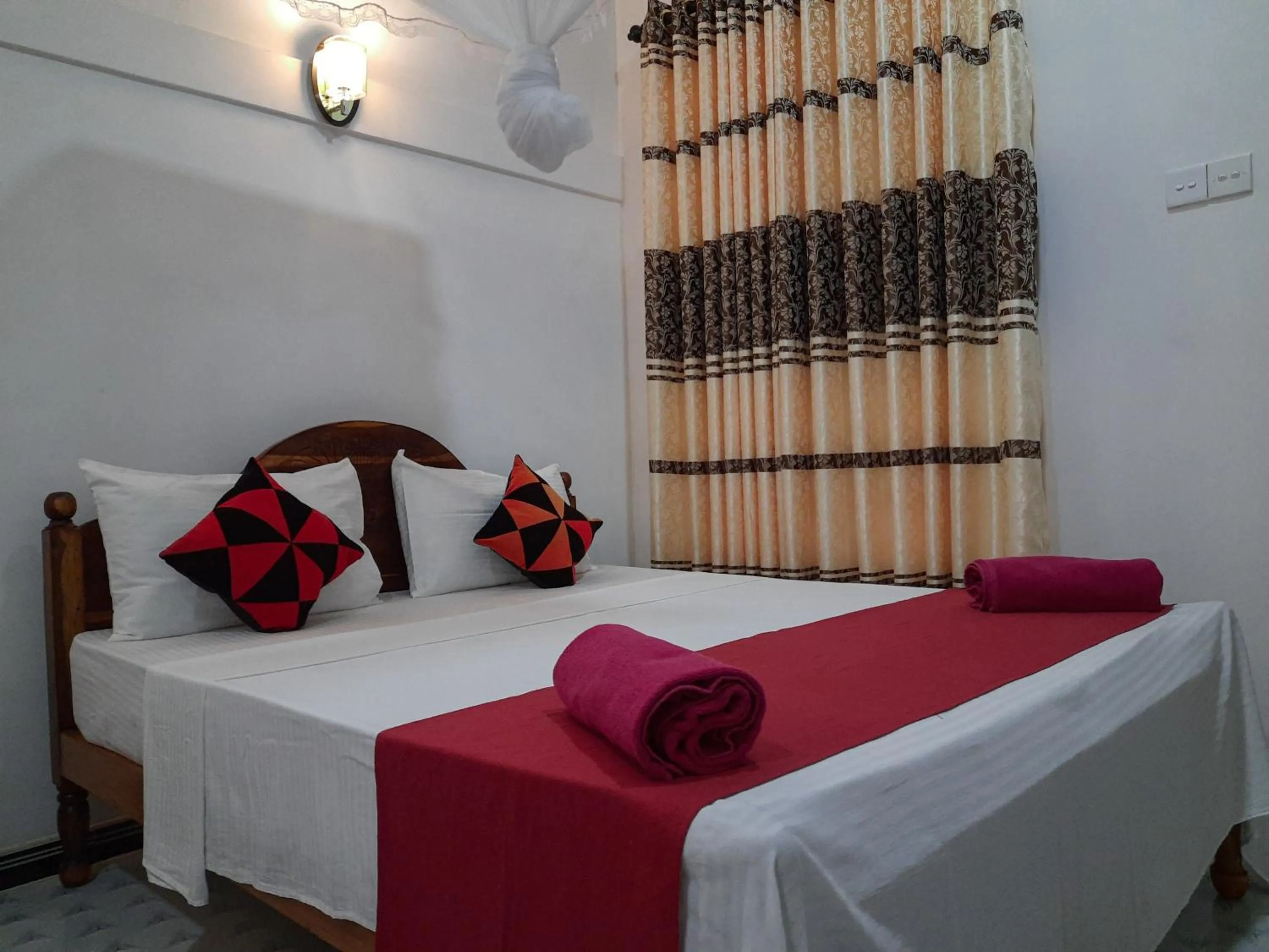 Bed in Sigiri Dasa Home stay
