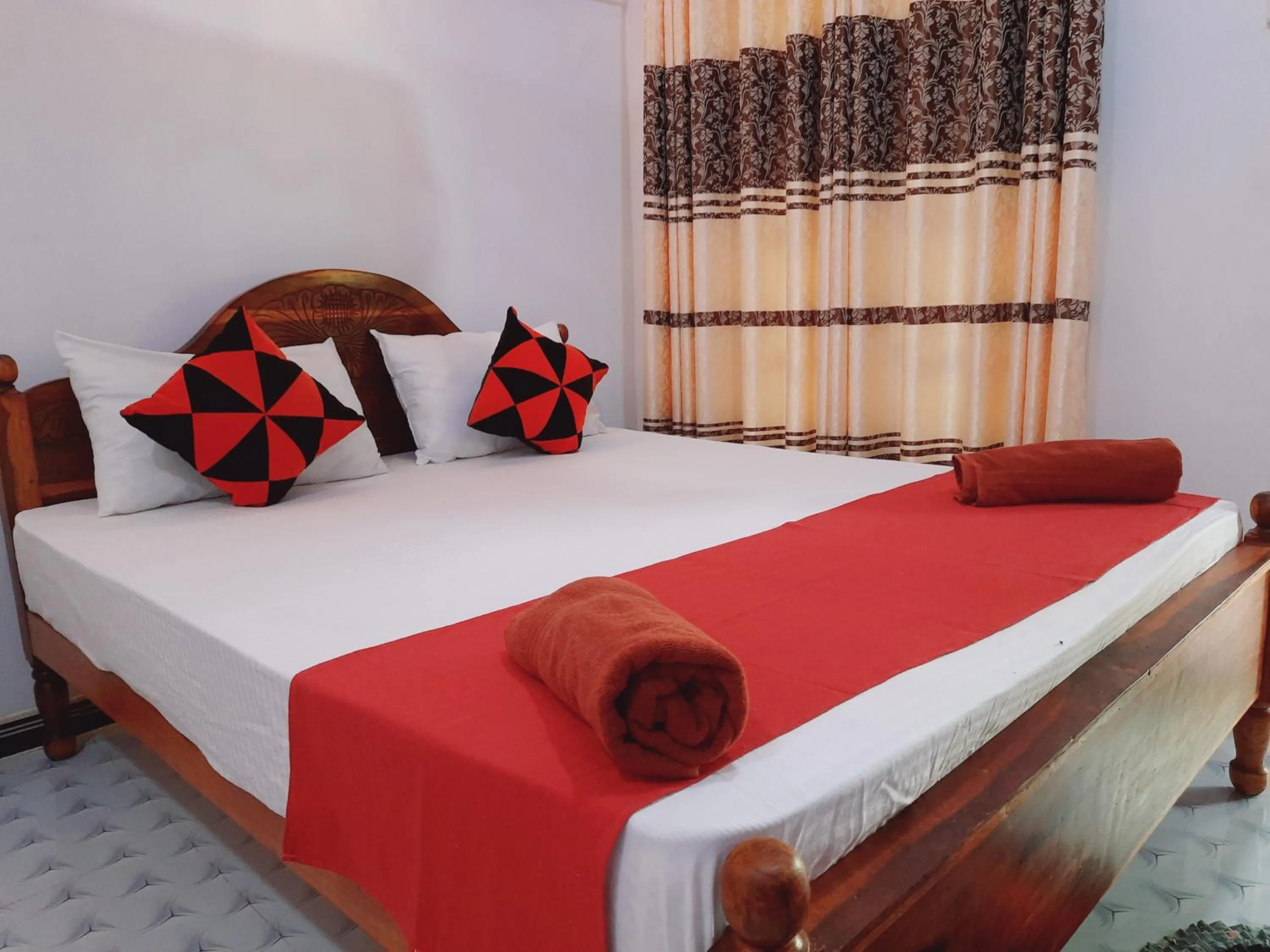 Bed in Sigiri Dasa Home stay