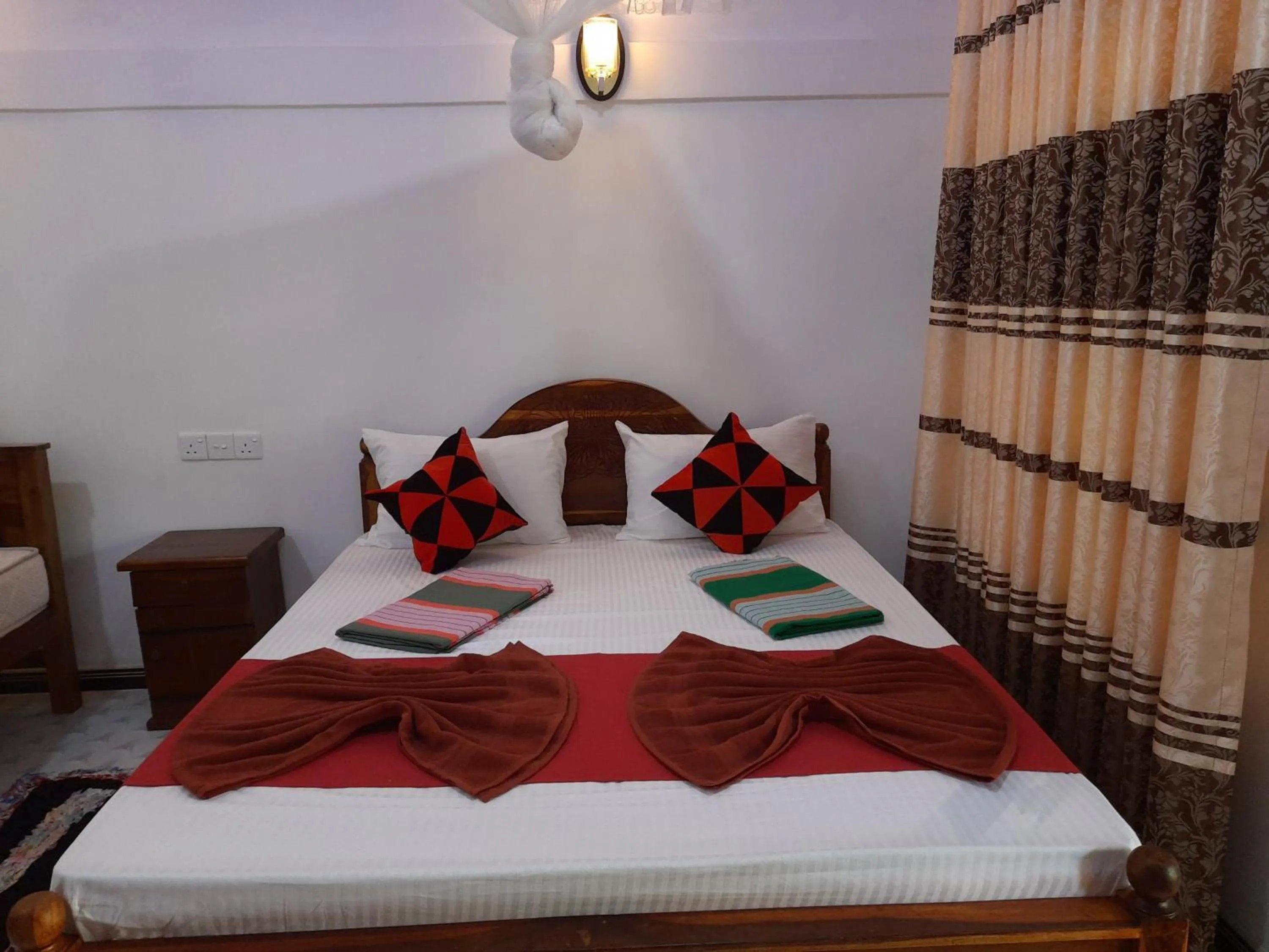 Bed in Sigiri Dasa Home stay