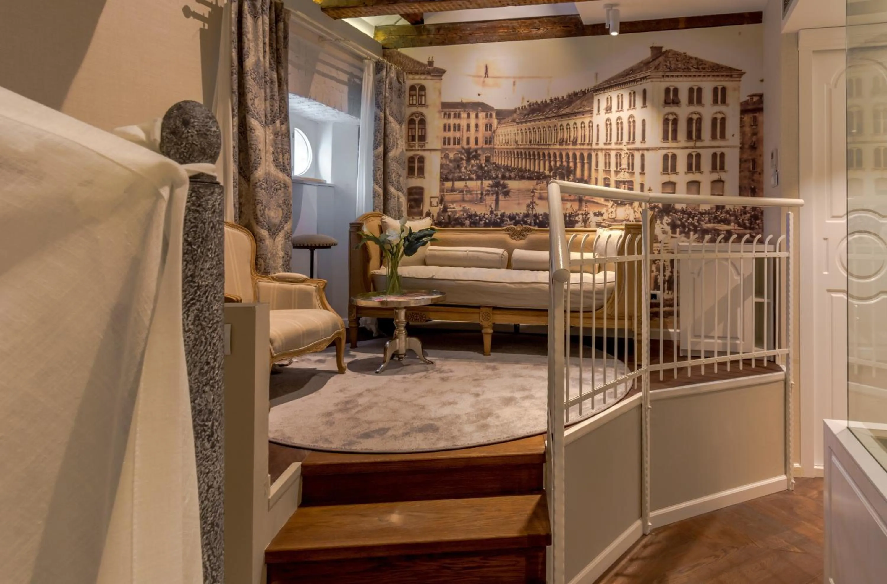 Seating area in Procurator 7 Luxury Rooms