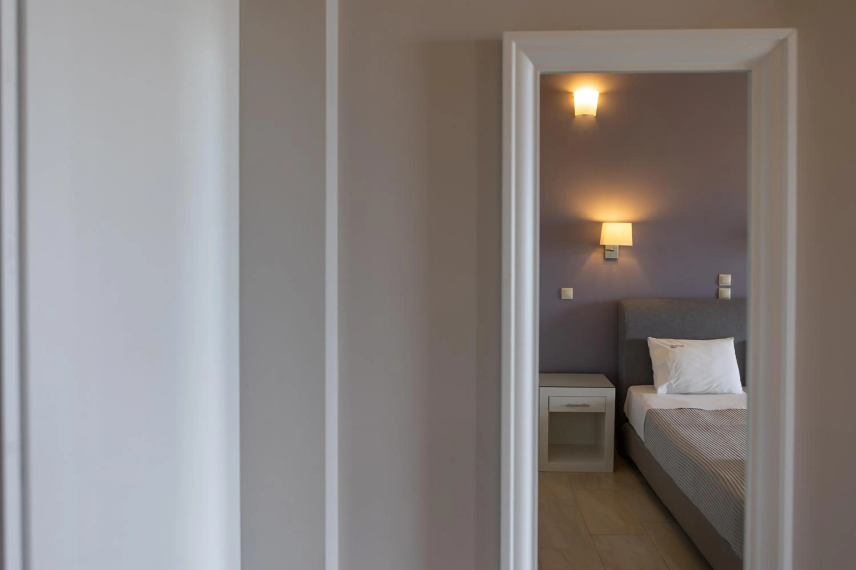 Bed in Tramonto Suites