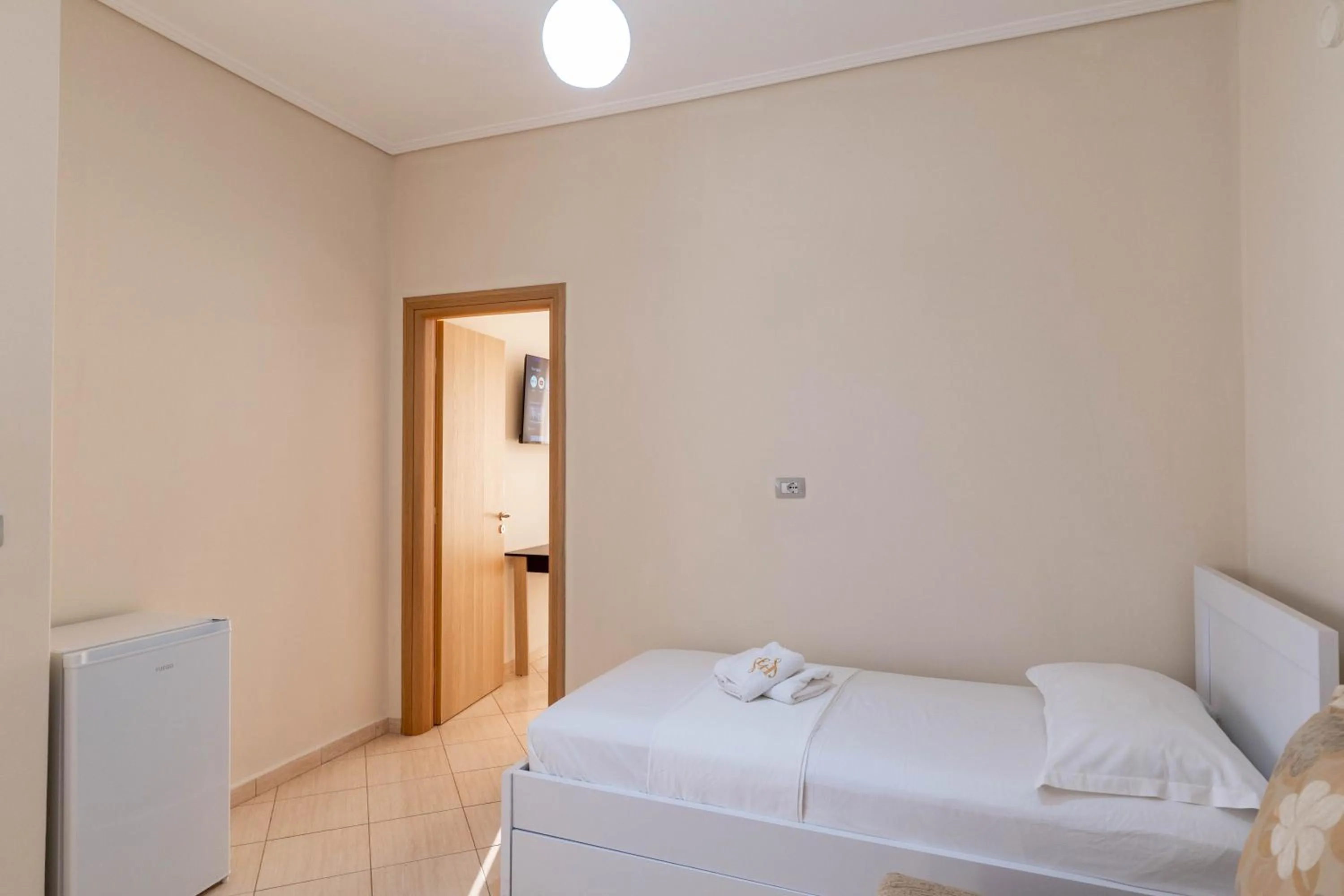 Bed in EROS HOTEL Ksamil