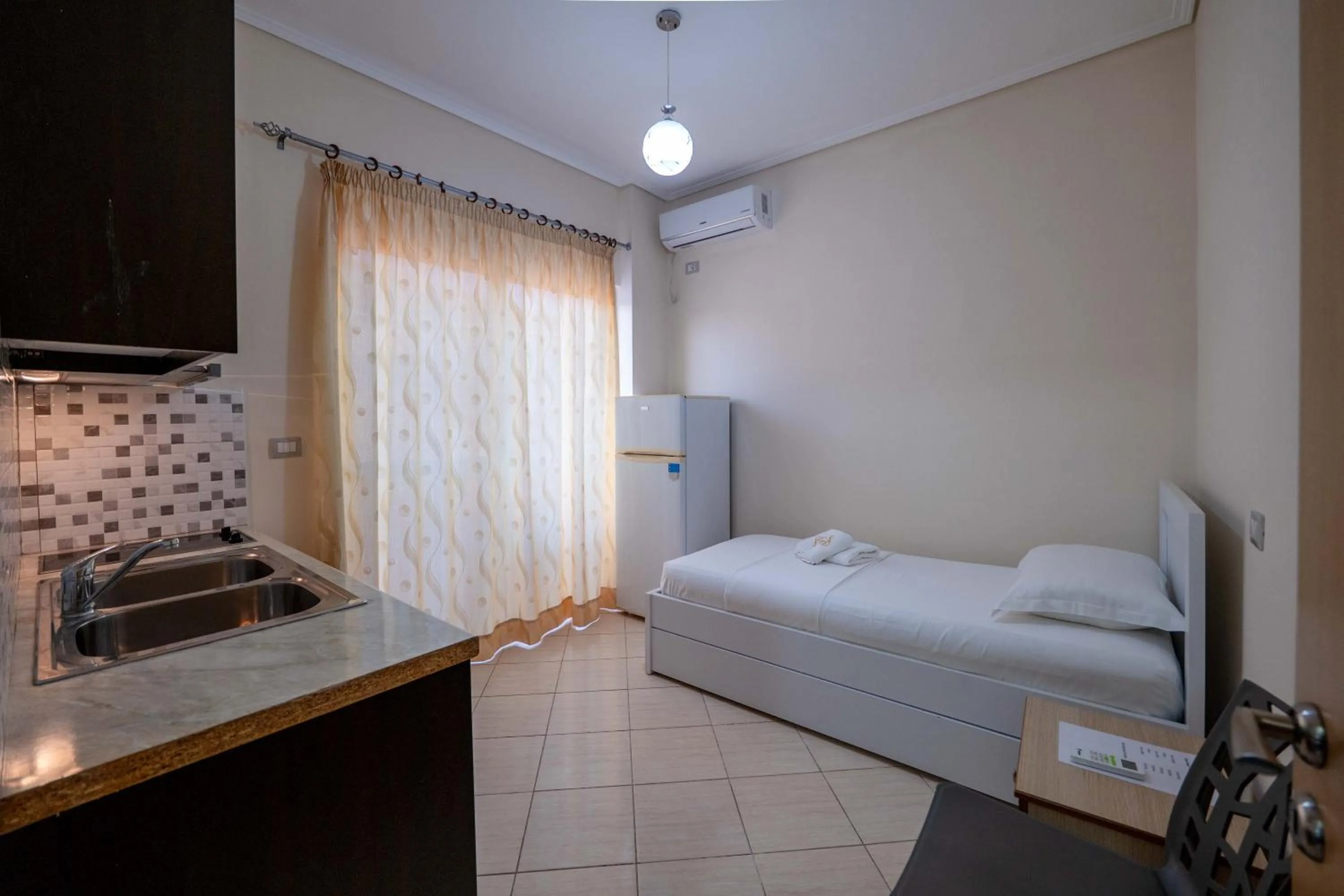 Bed in EROS HOTEL Ksamil