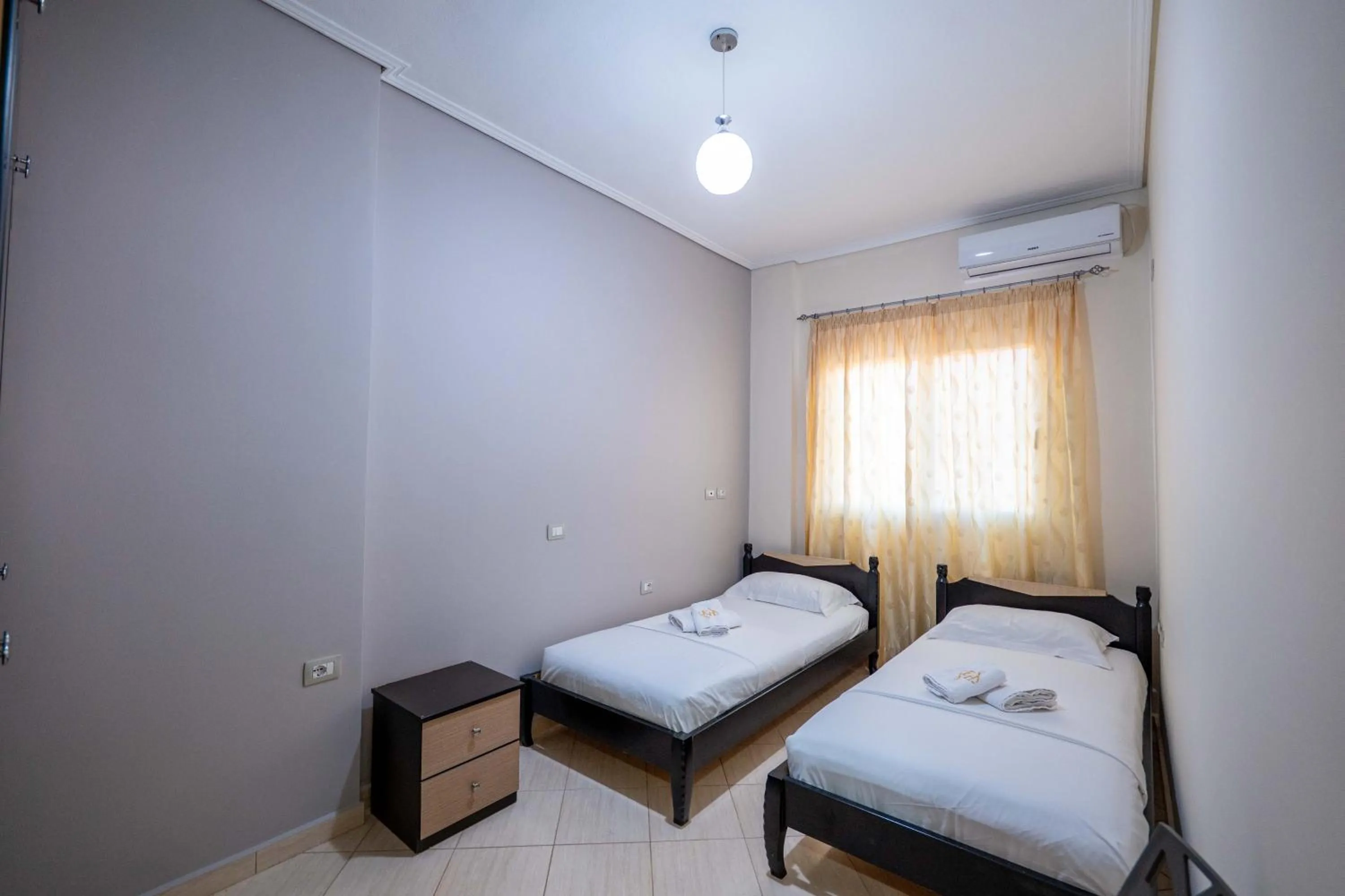 Bed in EROS HOTEL Ksamil