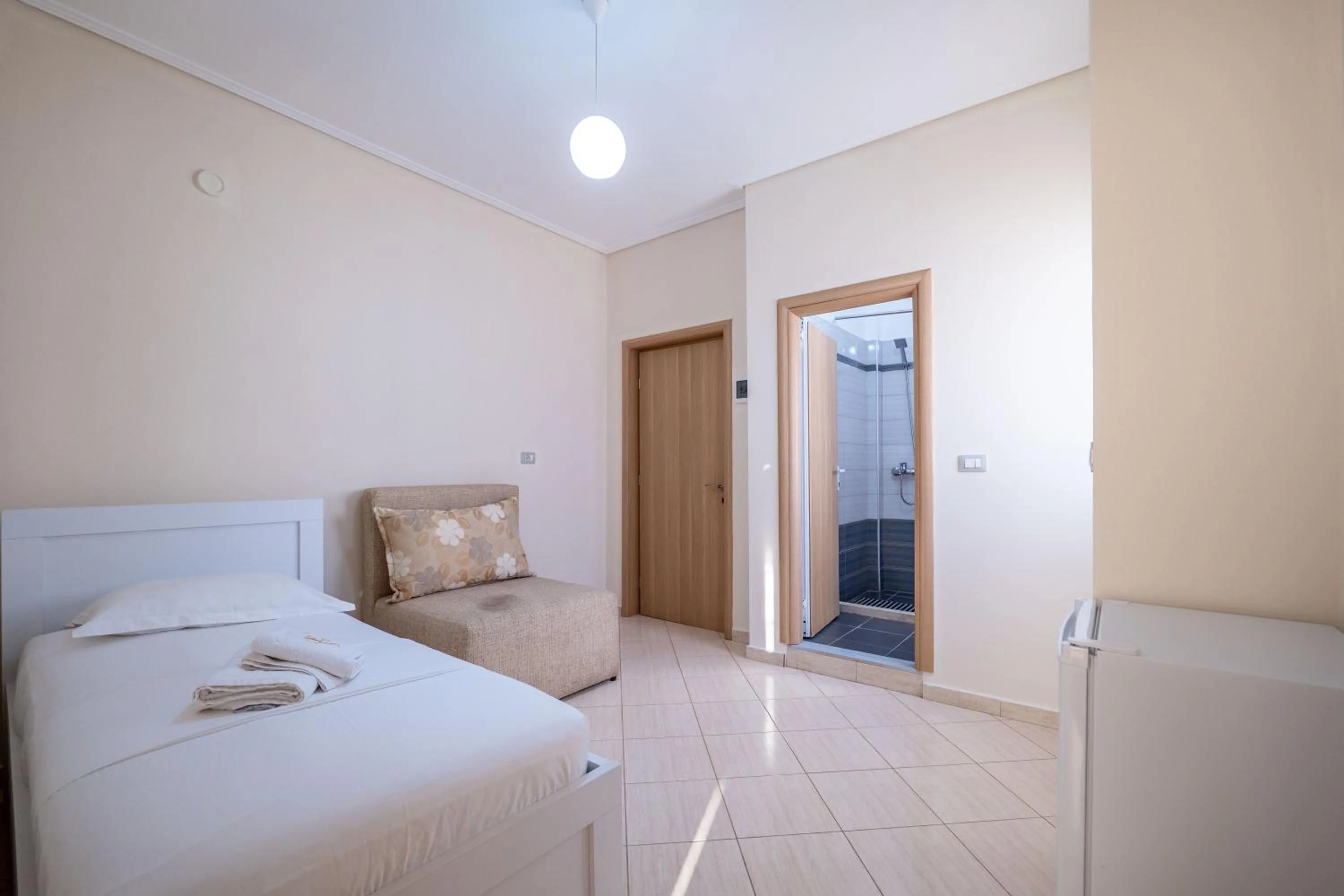 Bed in EROS HOTEL Ksamil