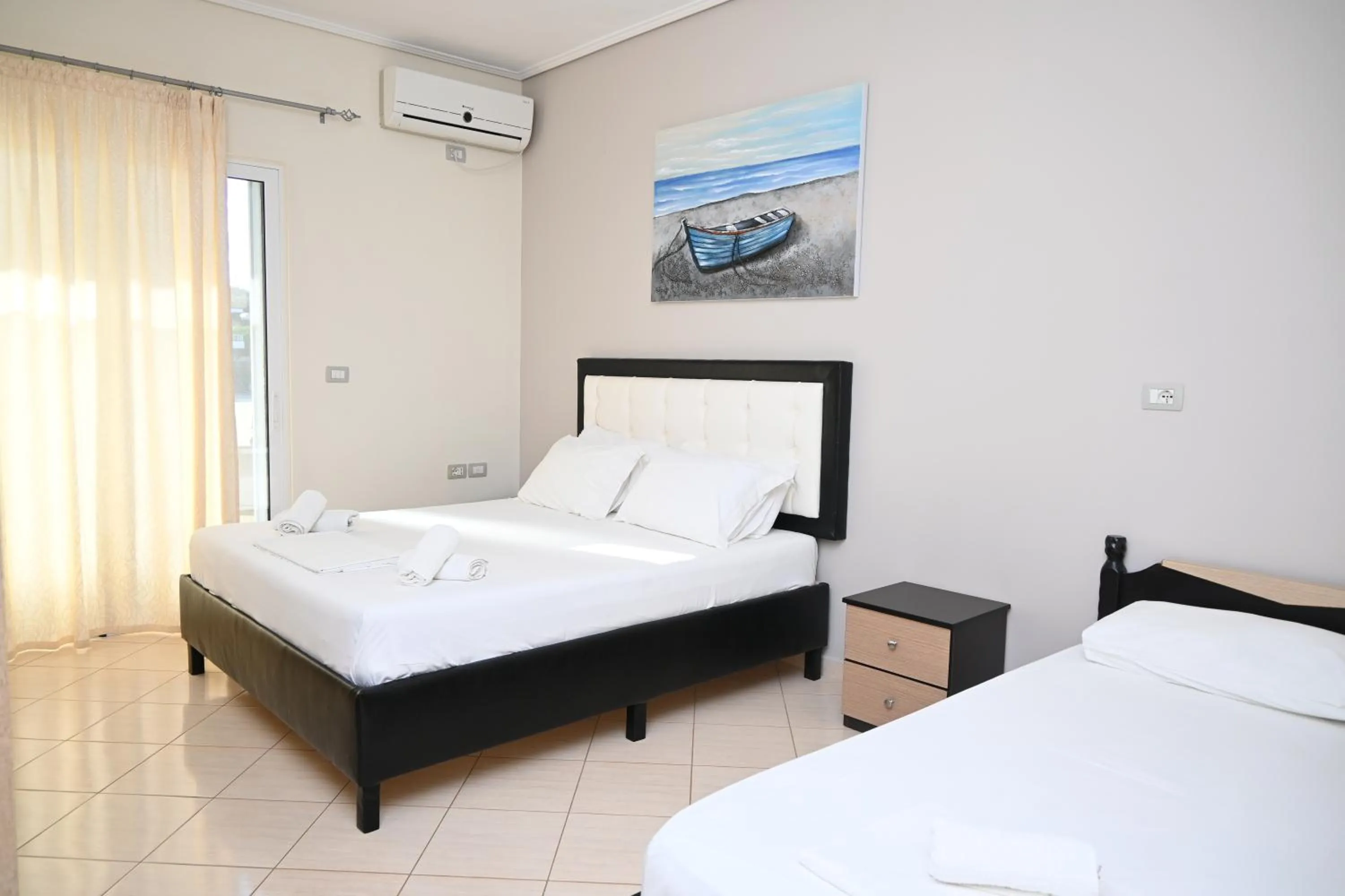 Bed in EROS HOTEL Ksamil