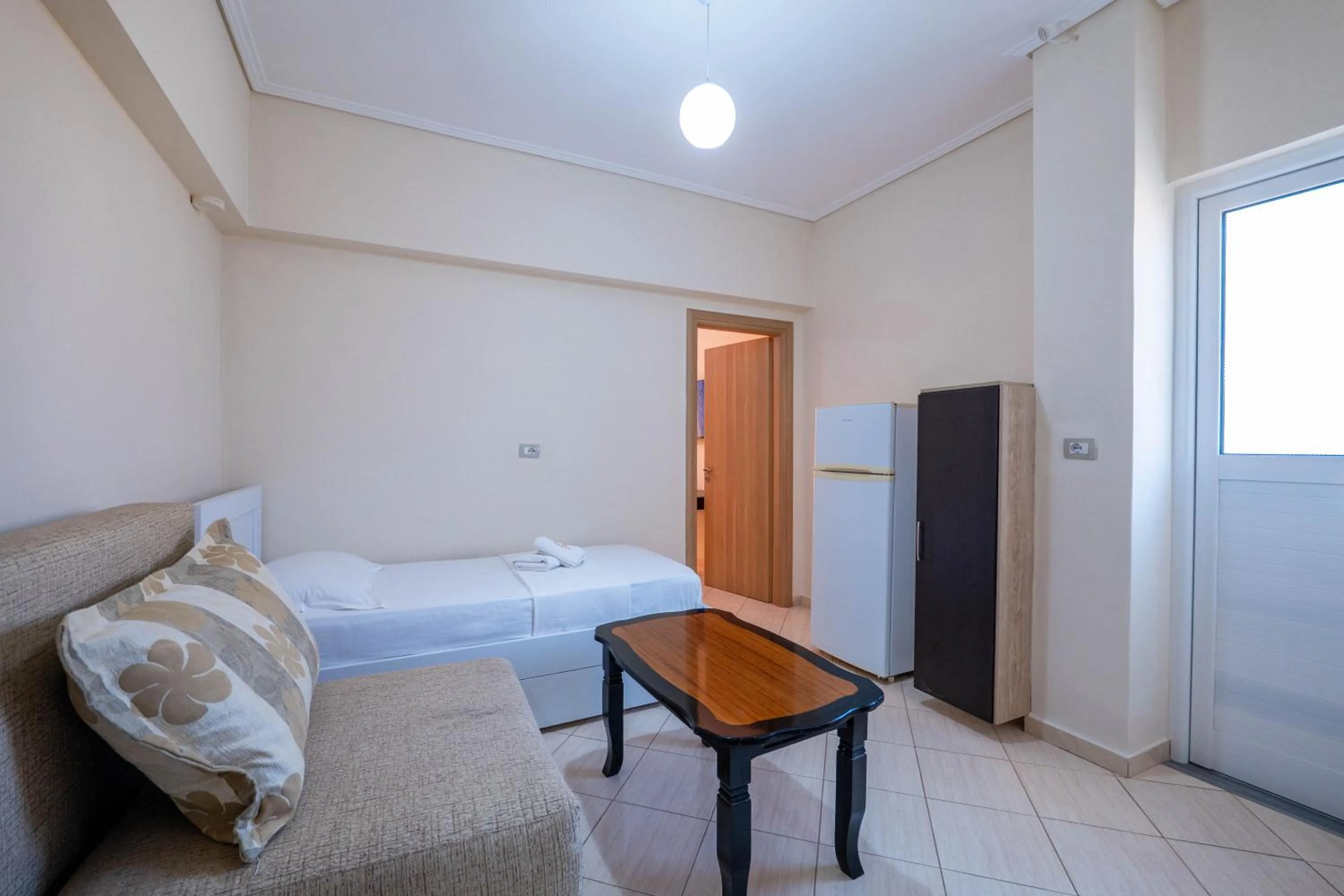 Living room, Bed in EROS HOTEL Ksamil