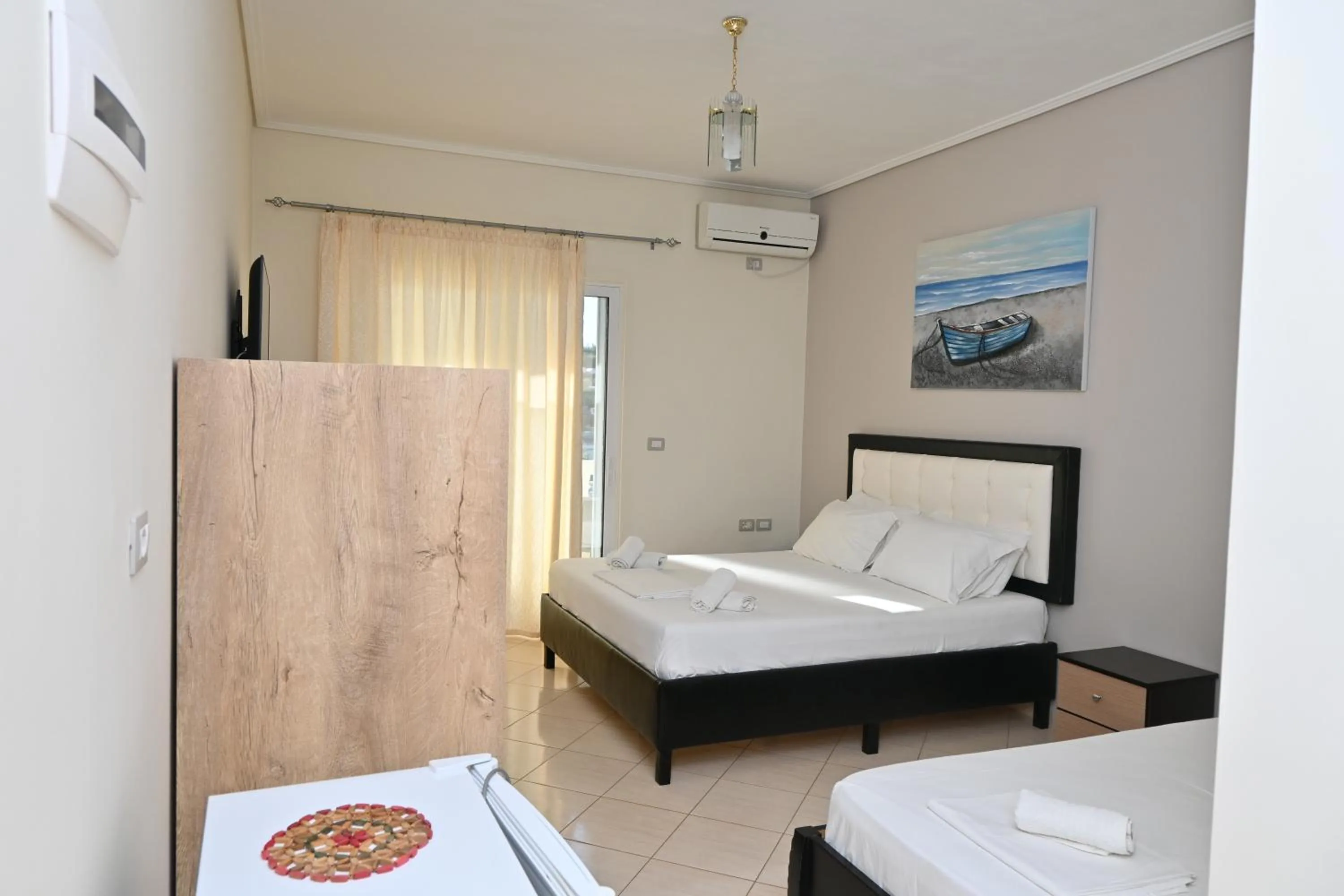 Living room, Bed in EROS HOTEL Ksamil