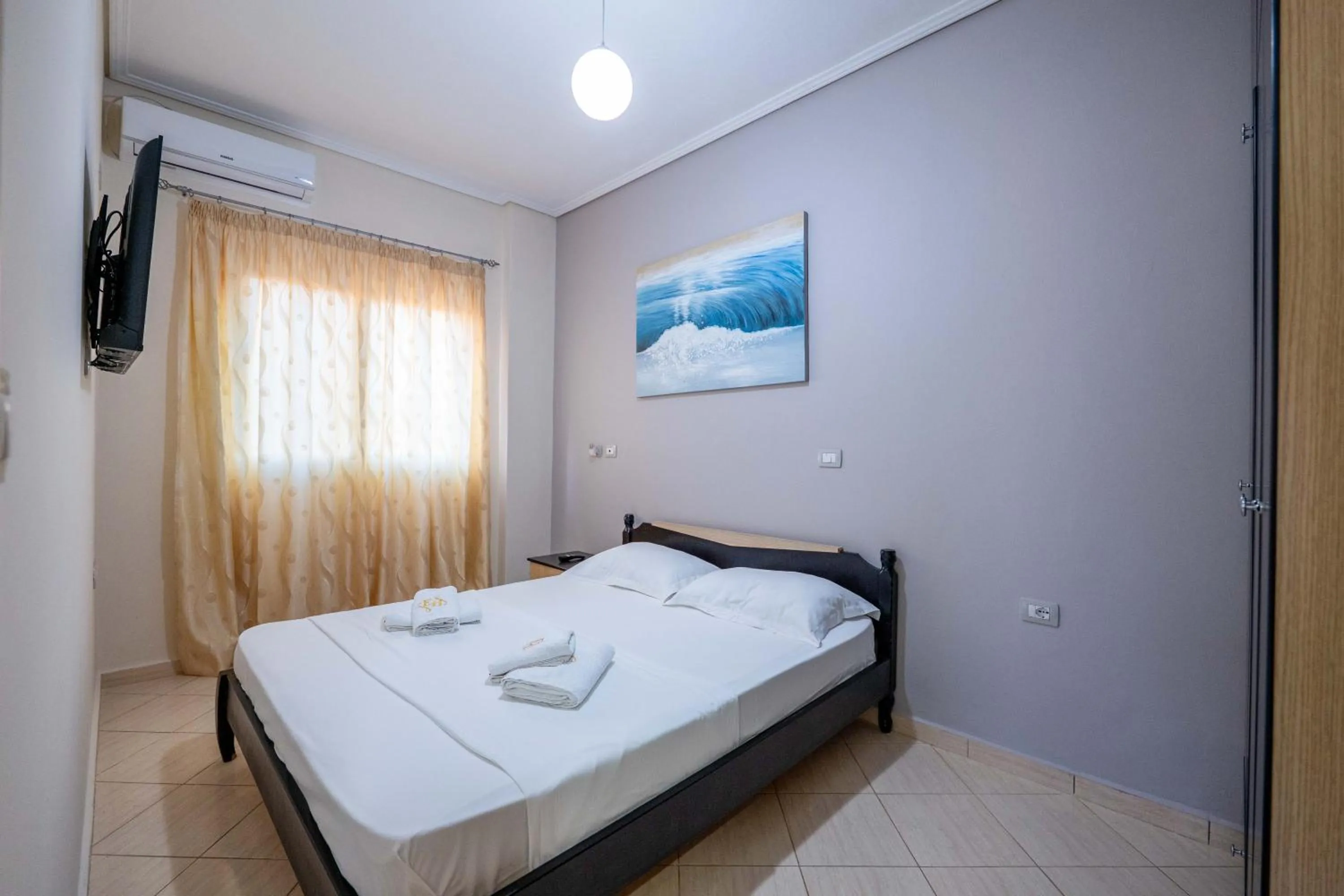 Bed in EROS HOTEL Ksamil