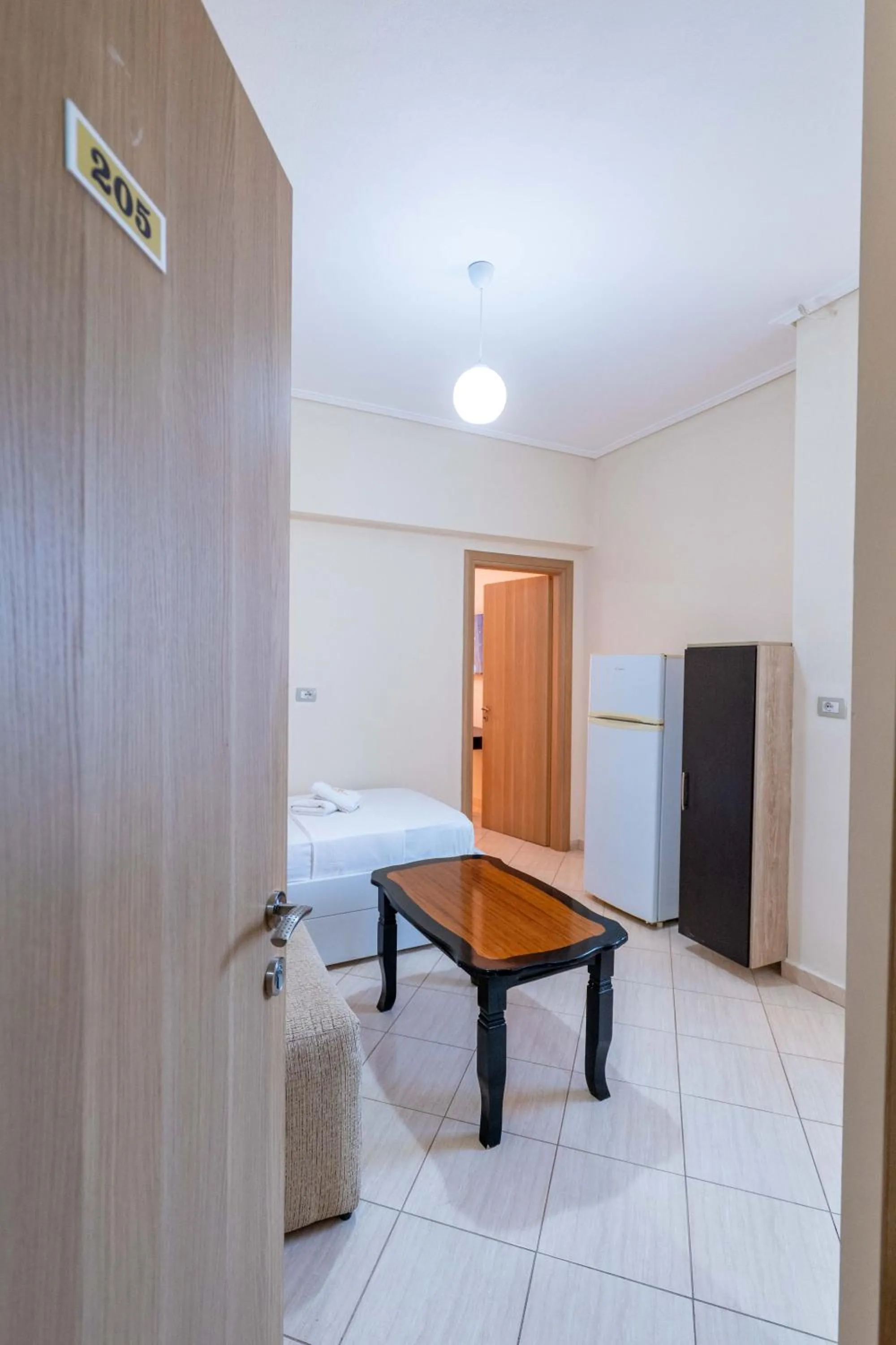 Living room, Bed in EROS HOTEL Ksamil
