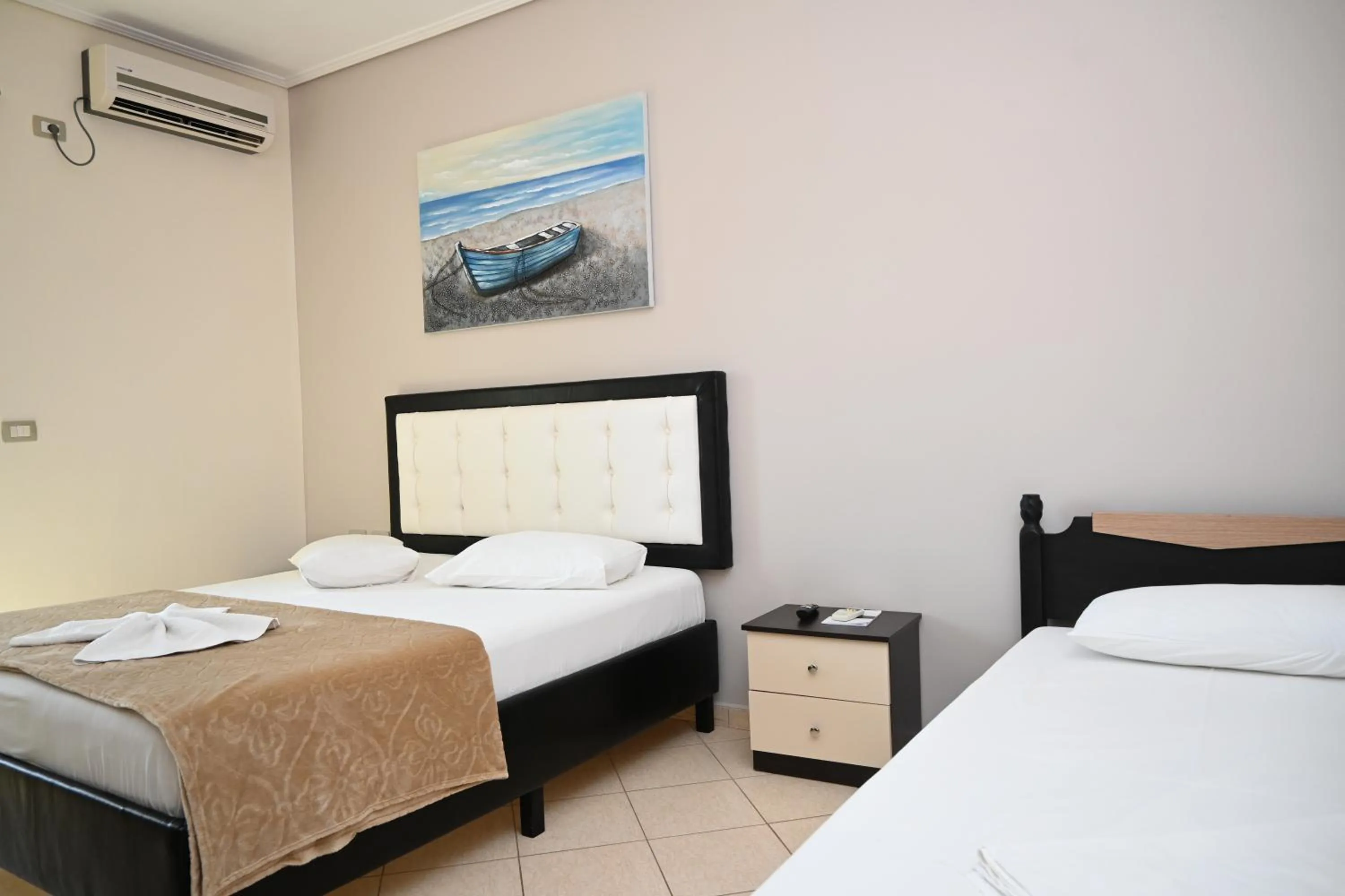 Bed in EROS HOTEL Ksamil