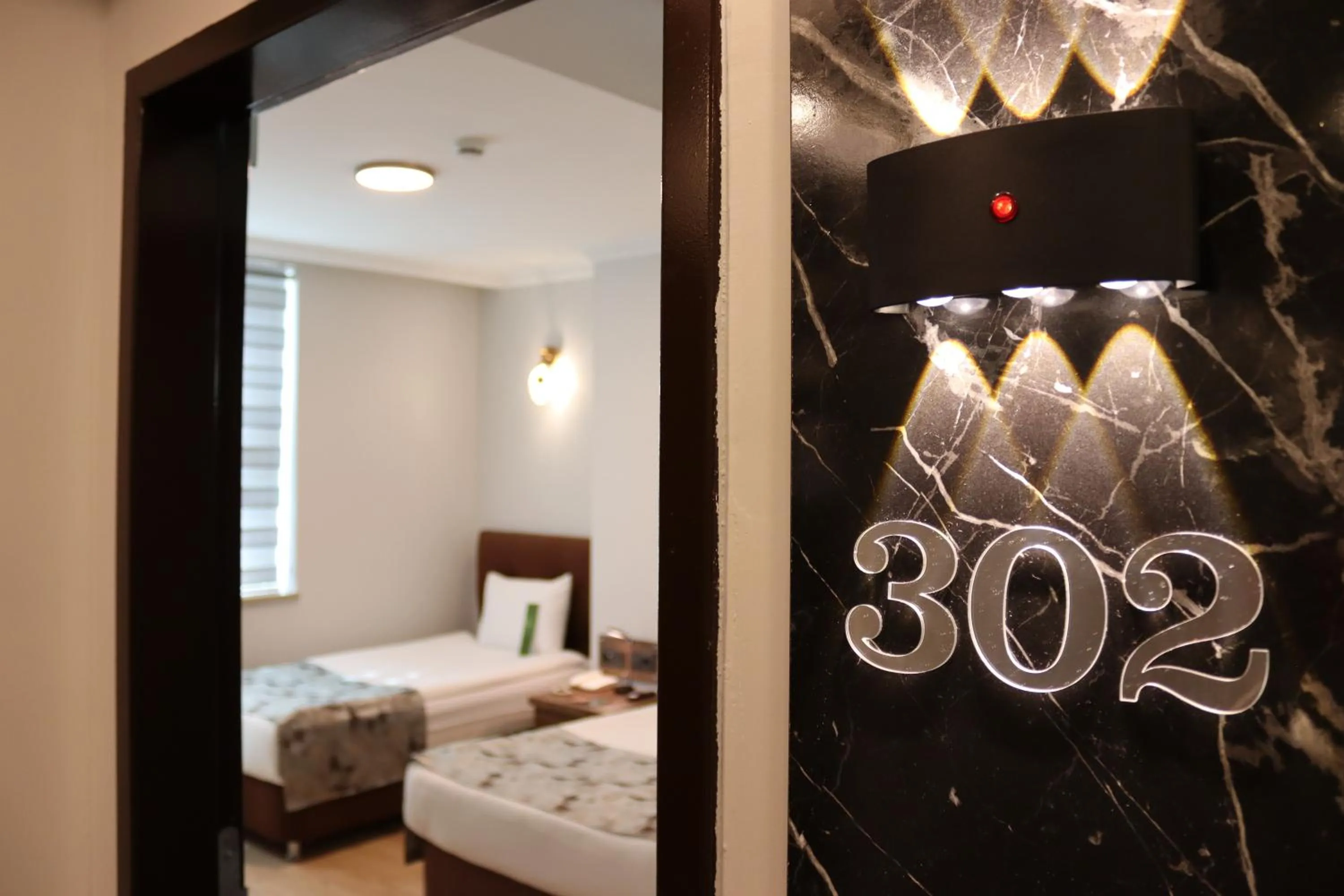 Photo of the whole room, Bed in Nif Ankara Hotel