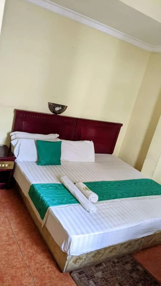 Bed in Rungwe Palace Hotel