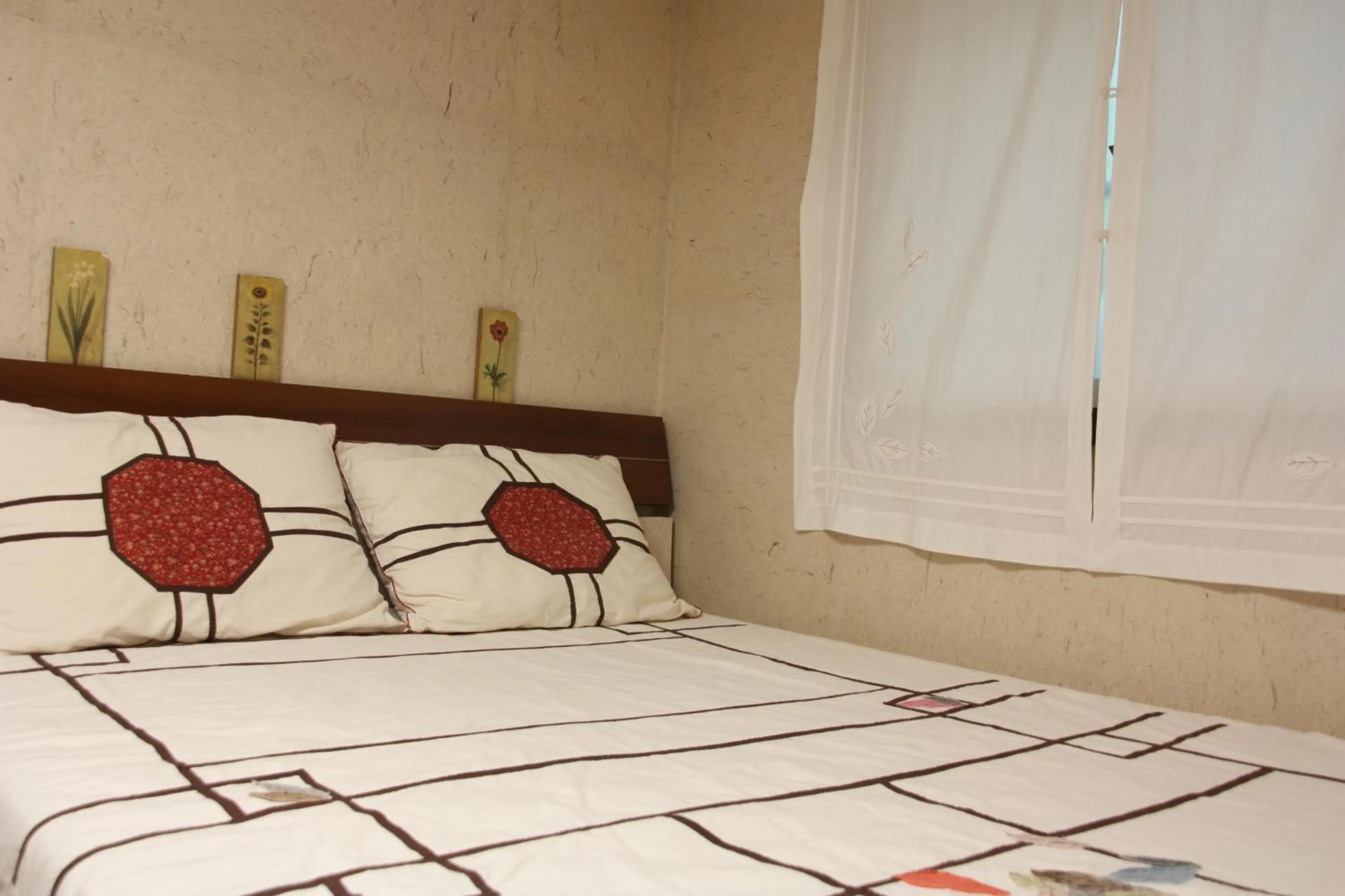 Bed in Lydia Craft Guesthouse