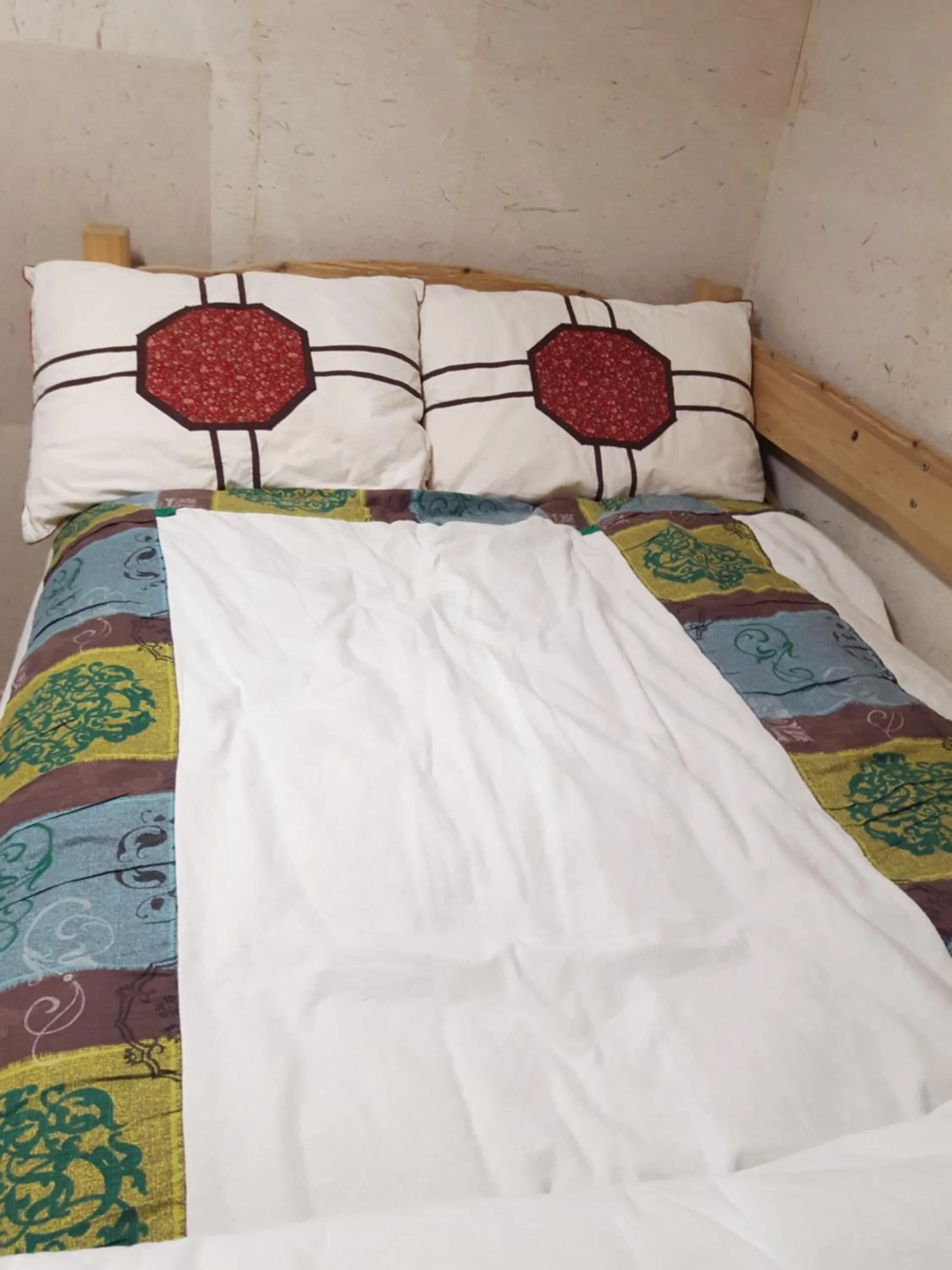 Bed in Lydia Craft Guesthouse