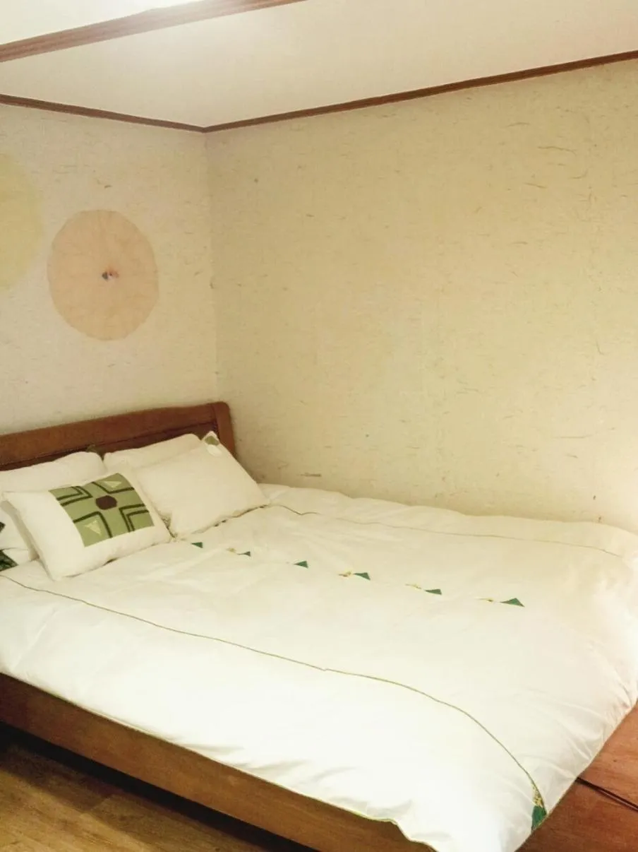 Bed in Lydia Craft Guesthouse