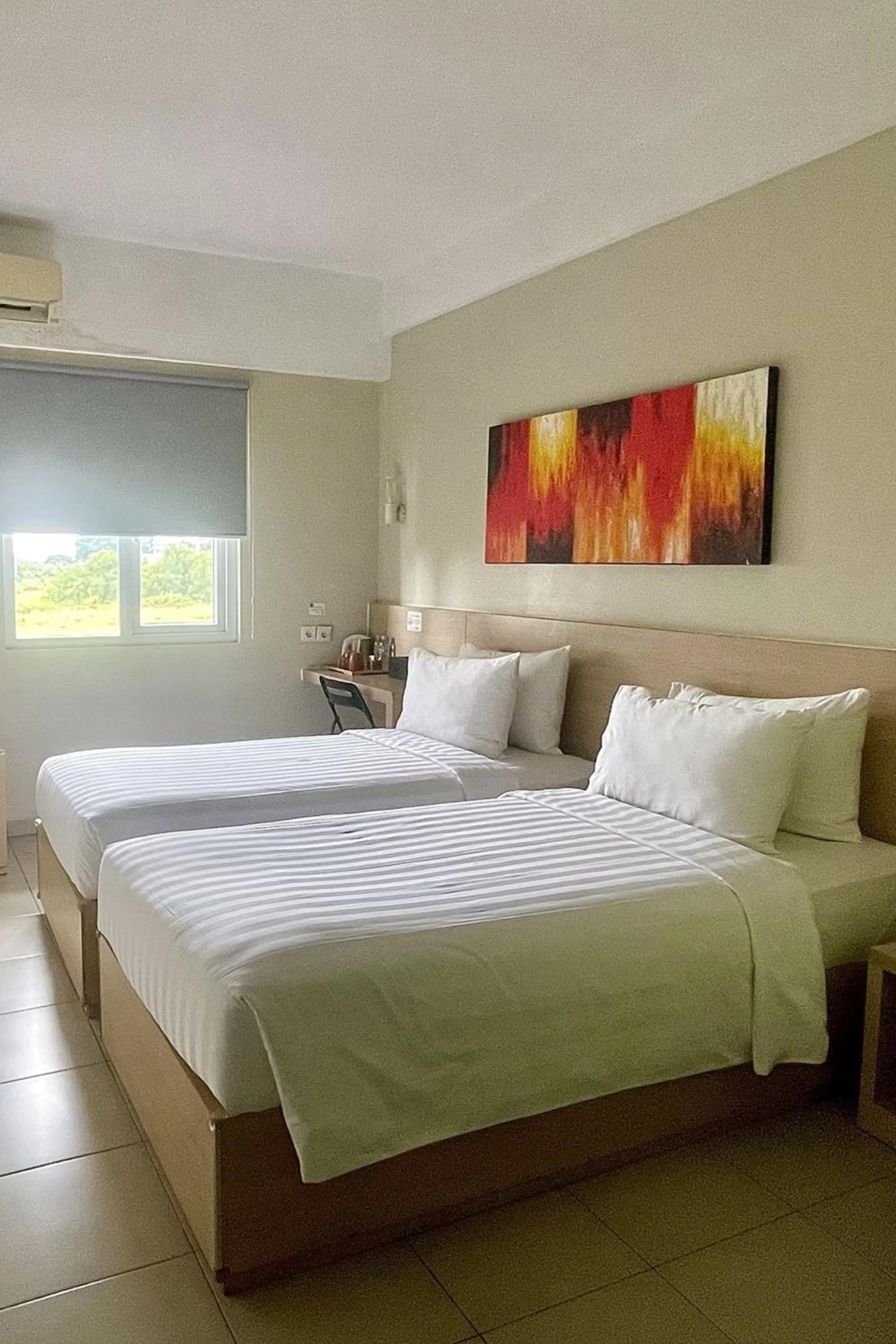 Bed in Lemo Hotel Serpong