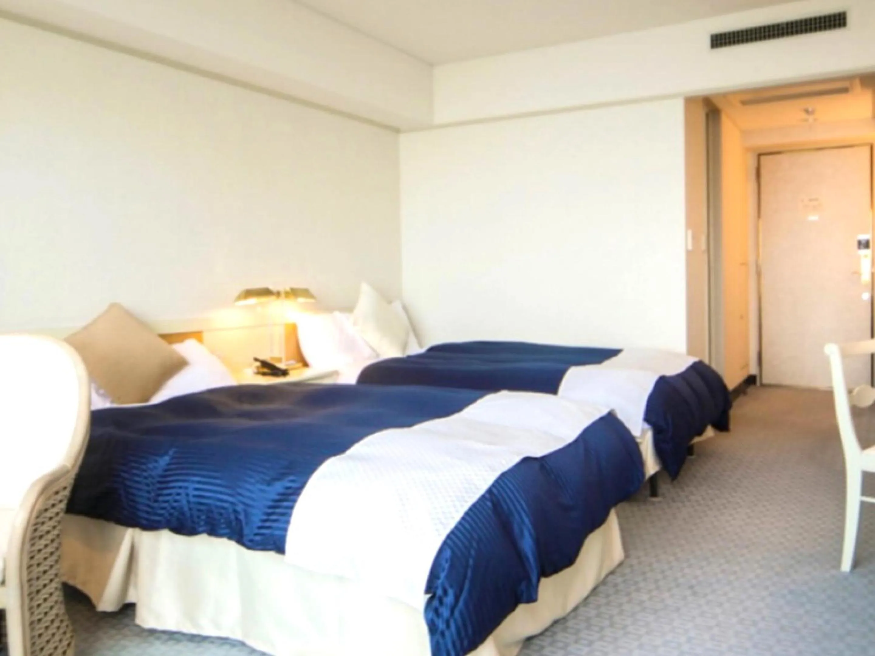 Bed in LiVEMAX RESORT Setouchi Sea Front