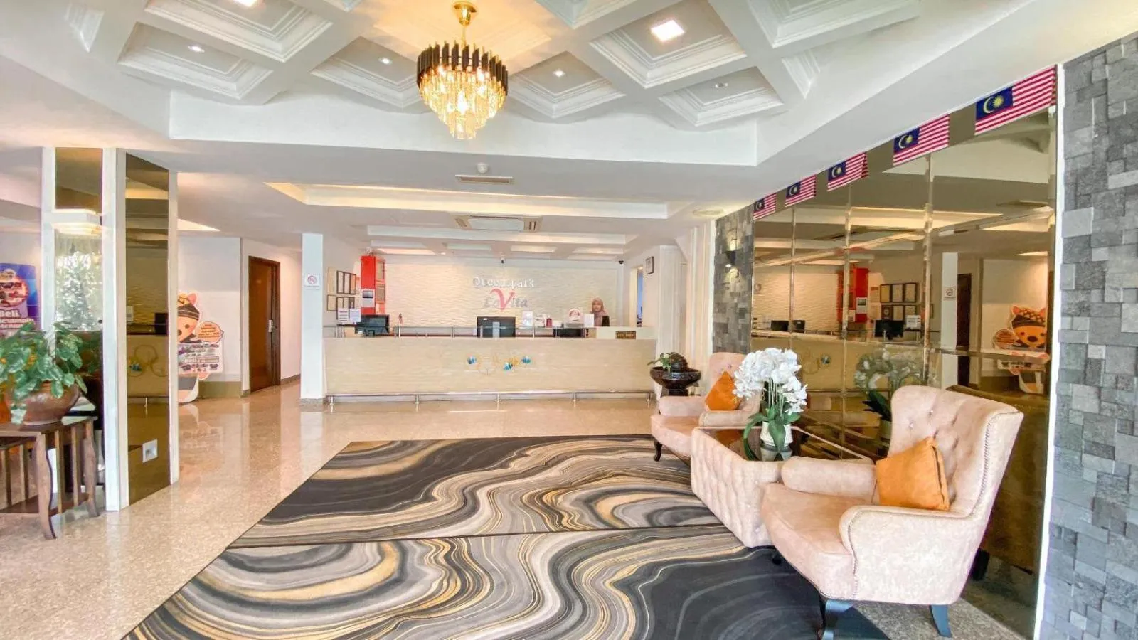 Lobby or reception in Queenspark Lovita Hotel
