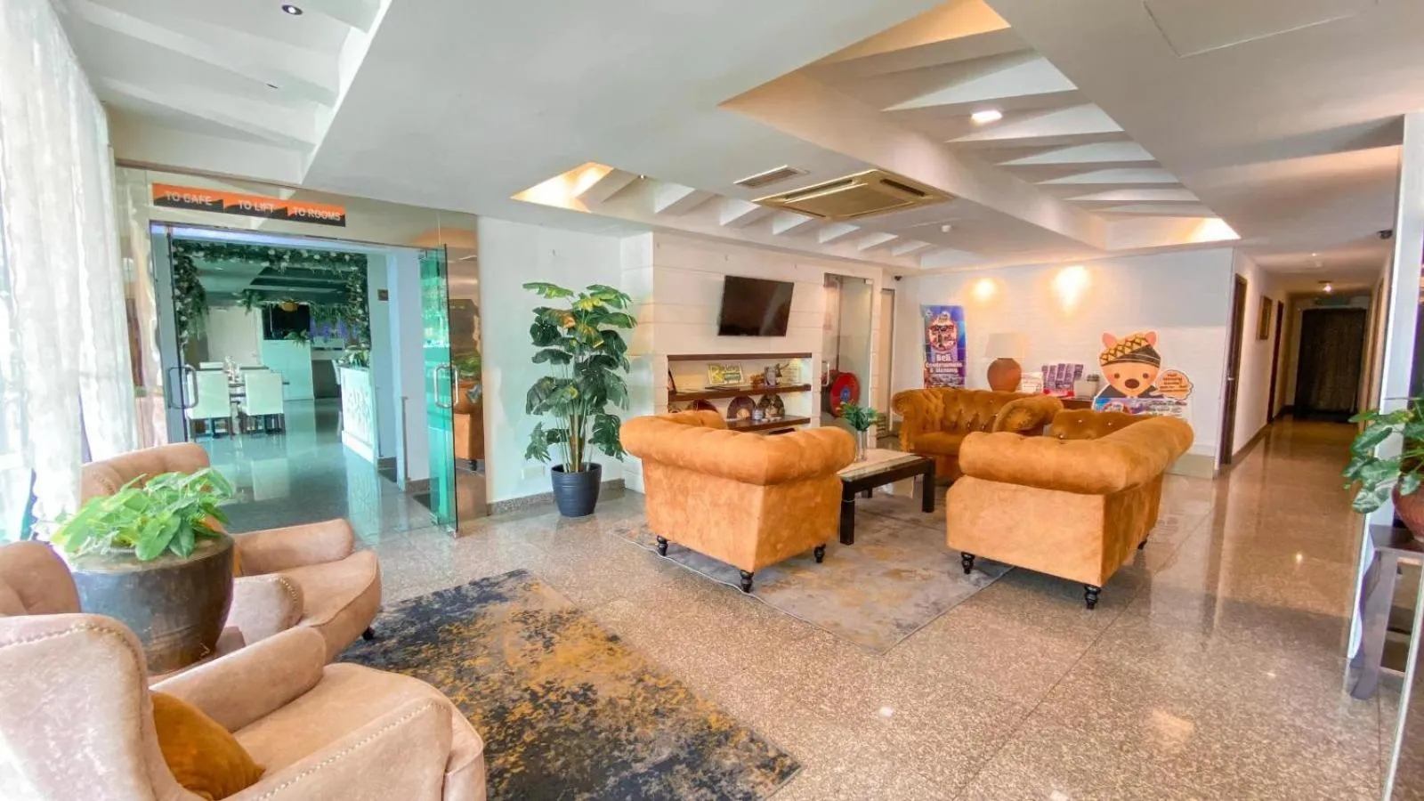 Lobby or reception in Queenspark Lovita Hotel