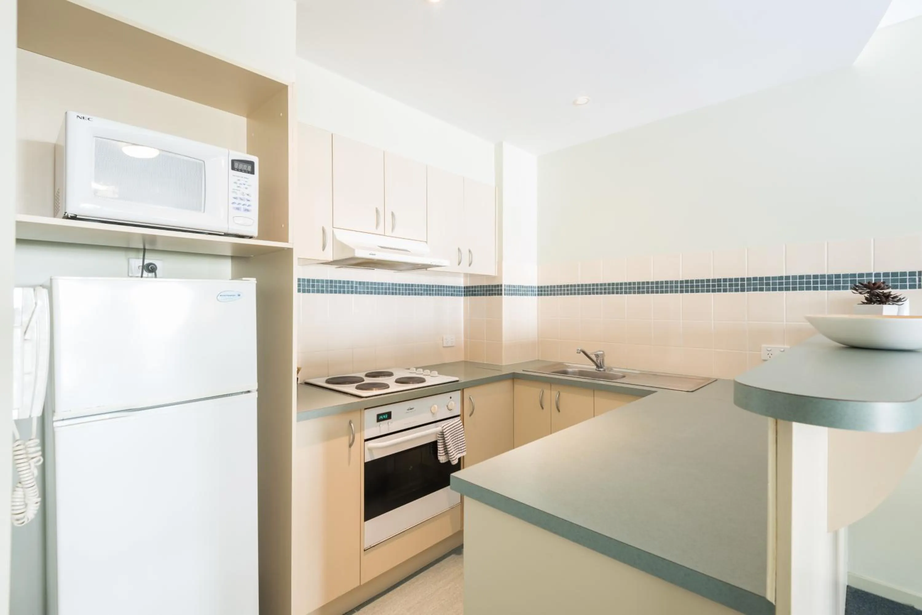 Kitchen or kitchenette in The Brighton Apartments