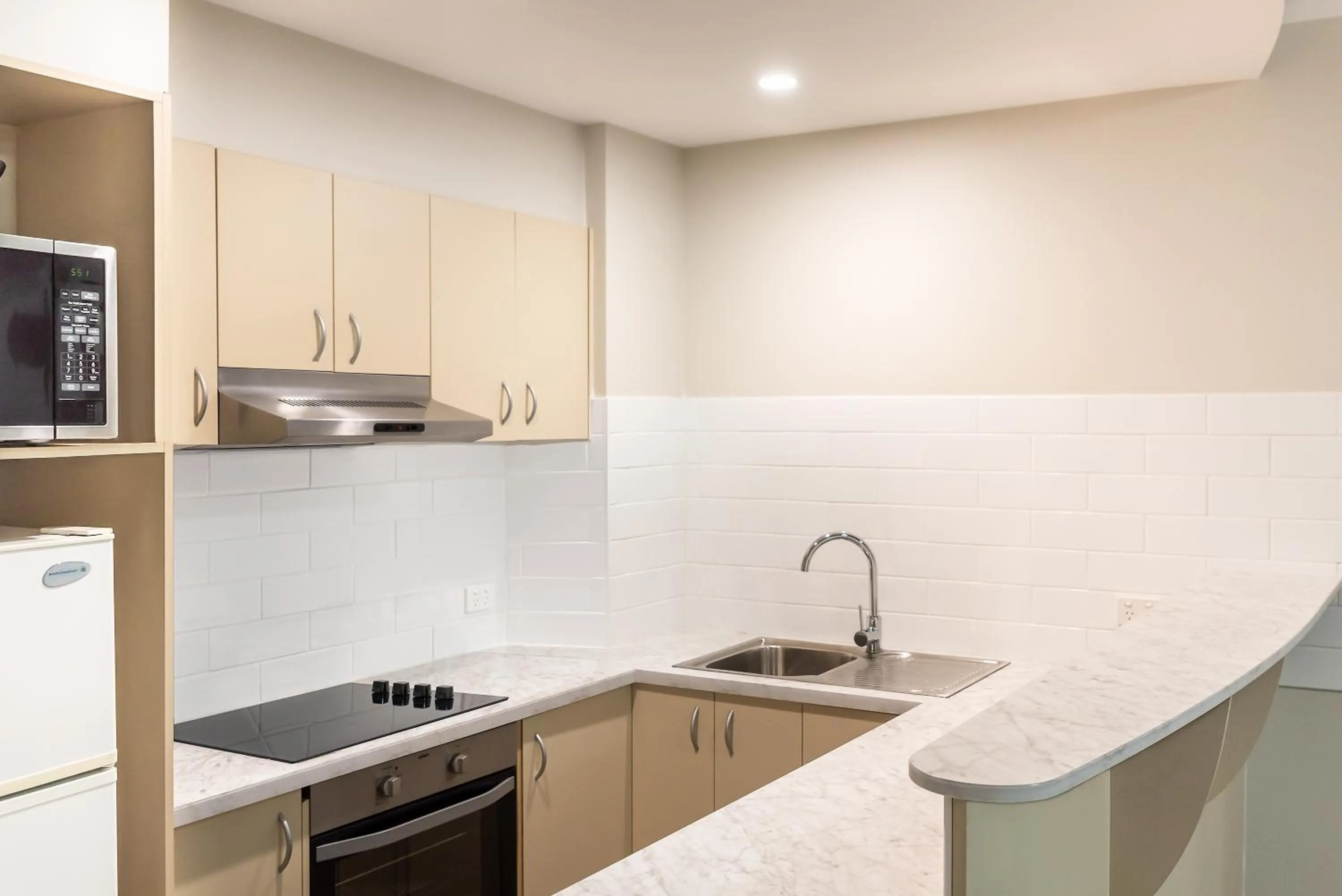 Kitchen or kitchenette in The Brighton Apartments