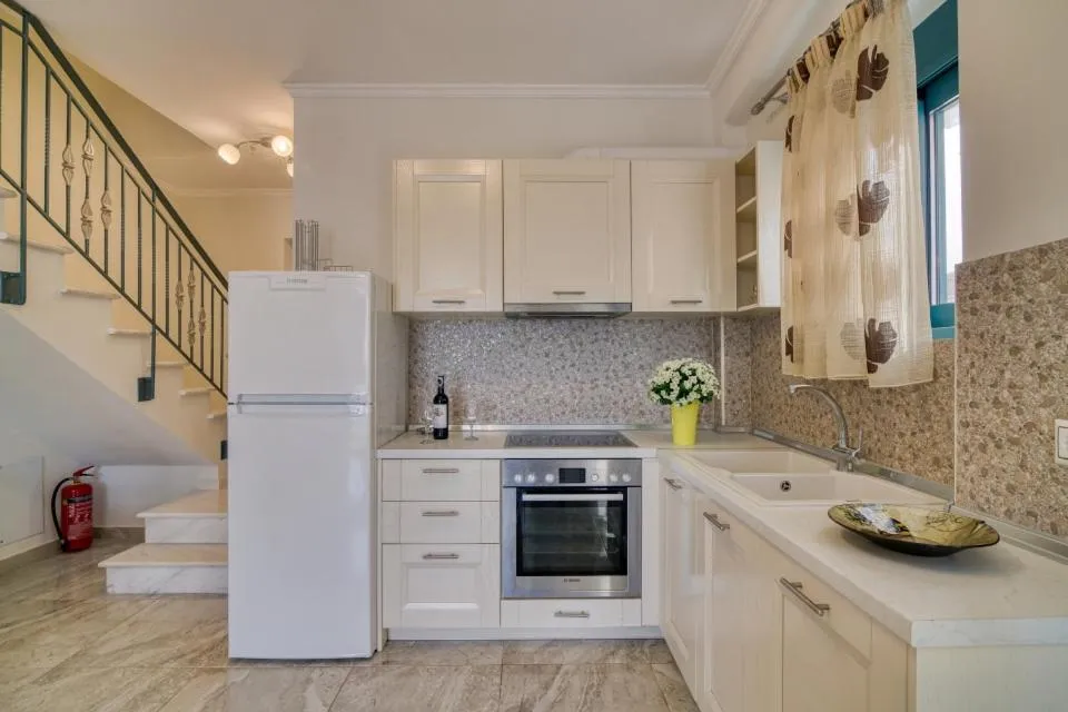 Kitchen or kitchenette in Anemos Villas