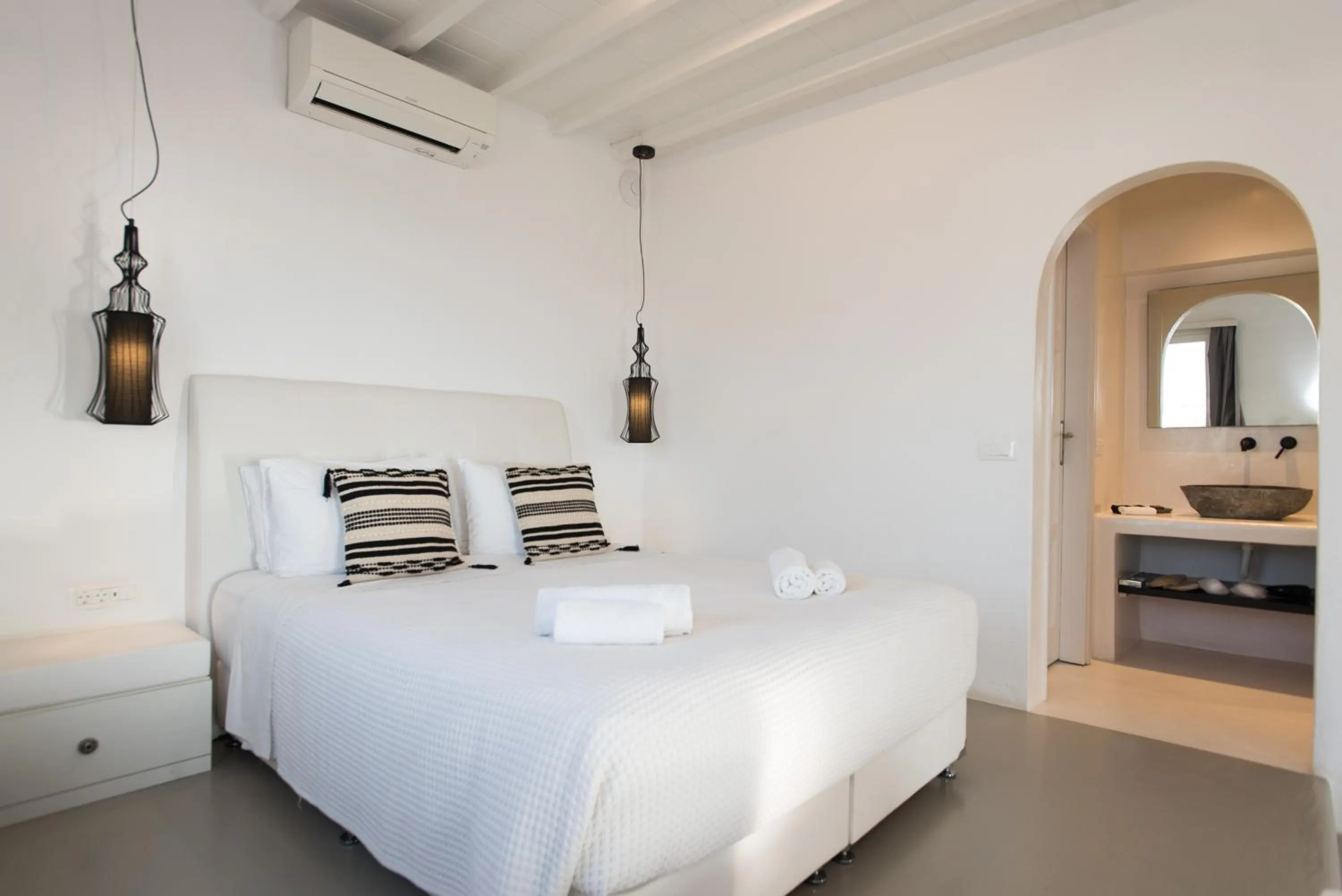 Bed in Bellou Suites