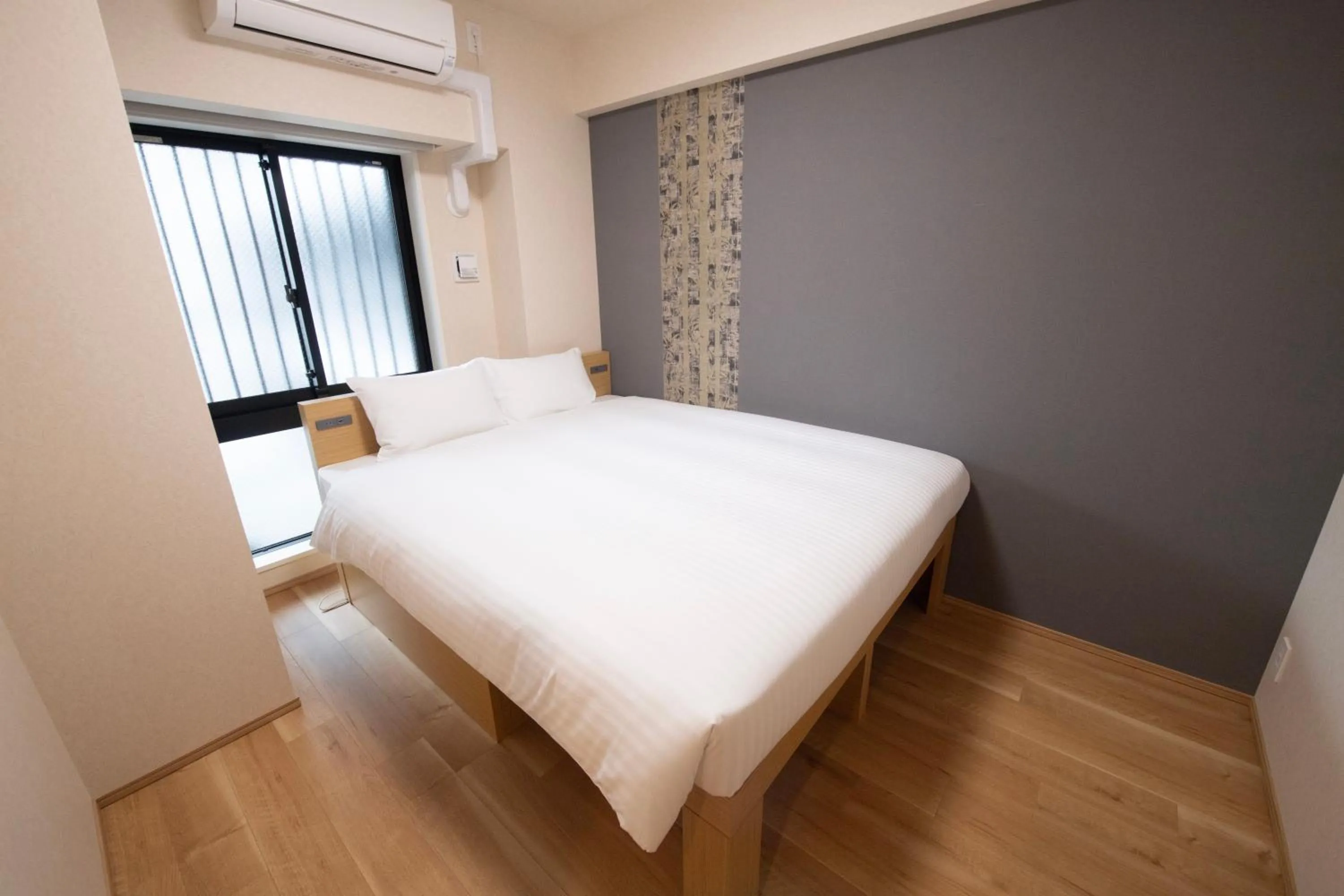Bed in THE RISE Osaka Universal Bayside