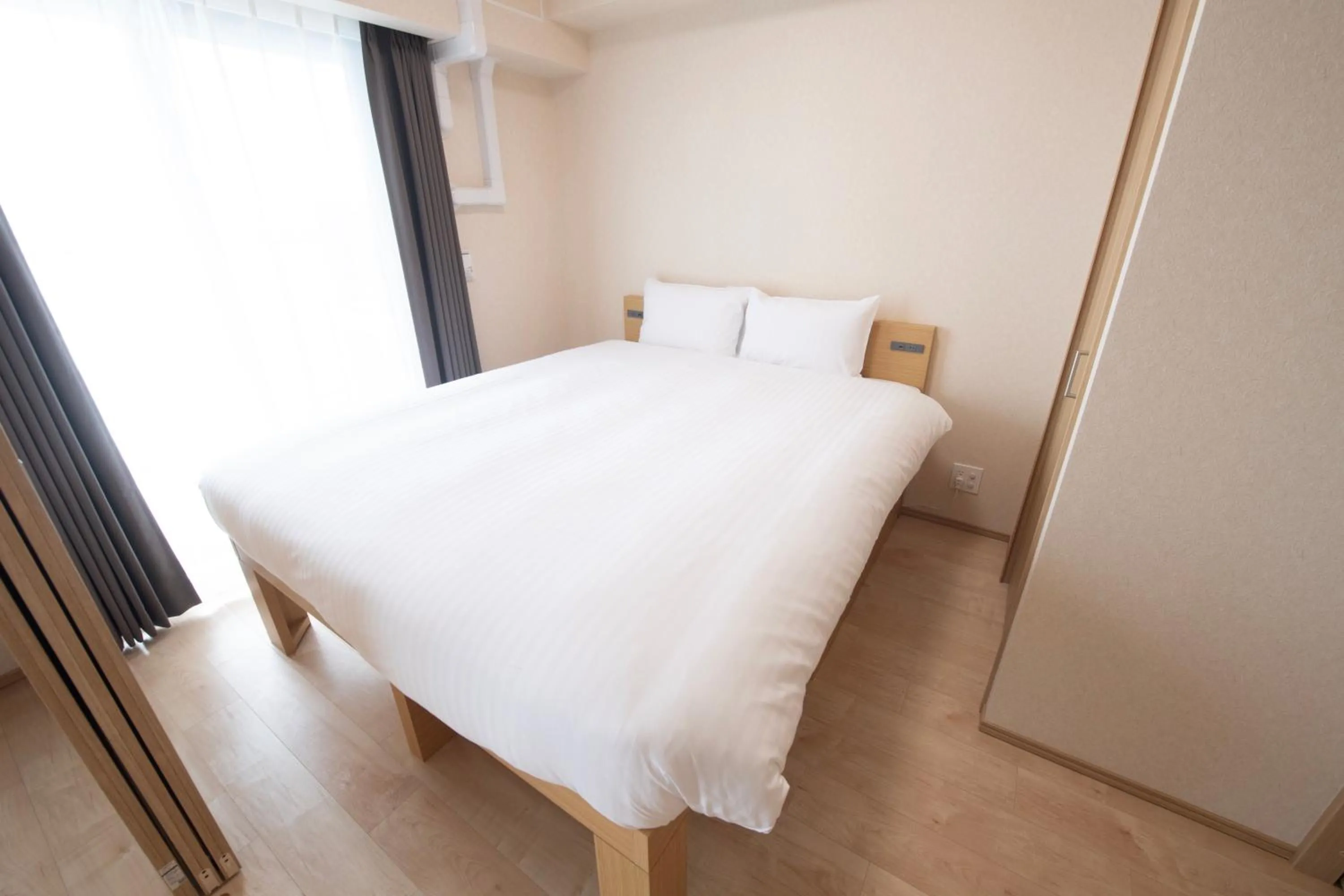 Bed in THE RISE Osaka Universal Bayside