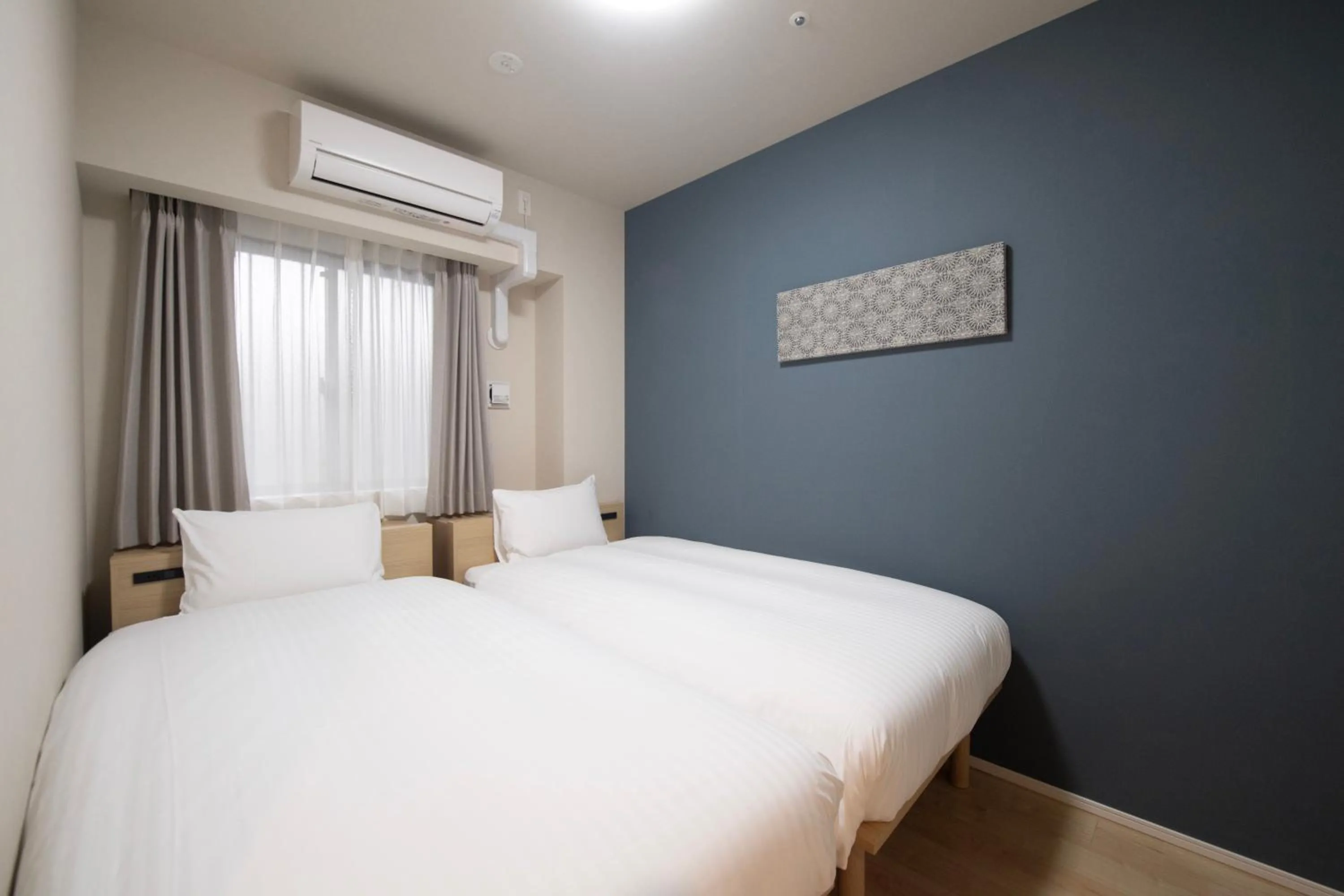 Bed in THE RISE Osaka Universal Bayside