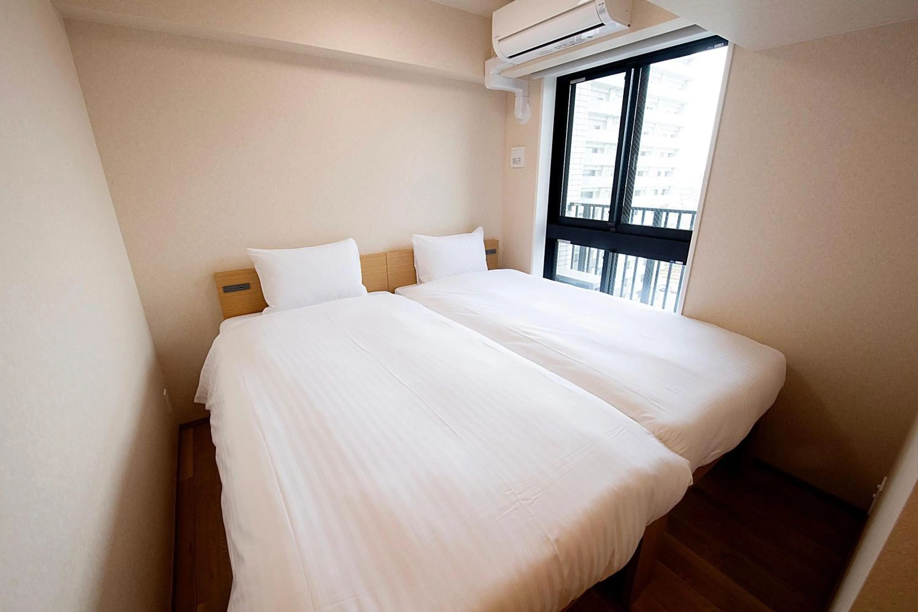 Bed in THE RISE Osaka Universal Bayside
