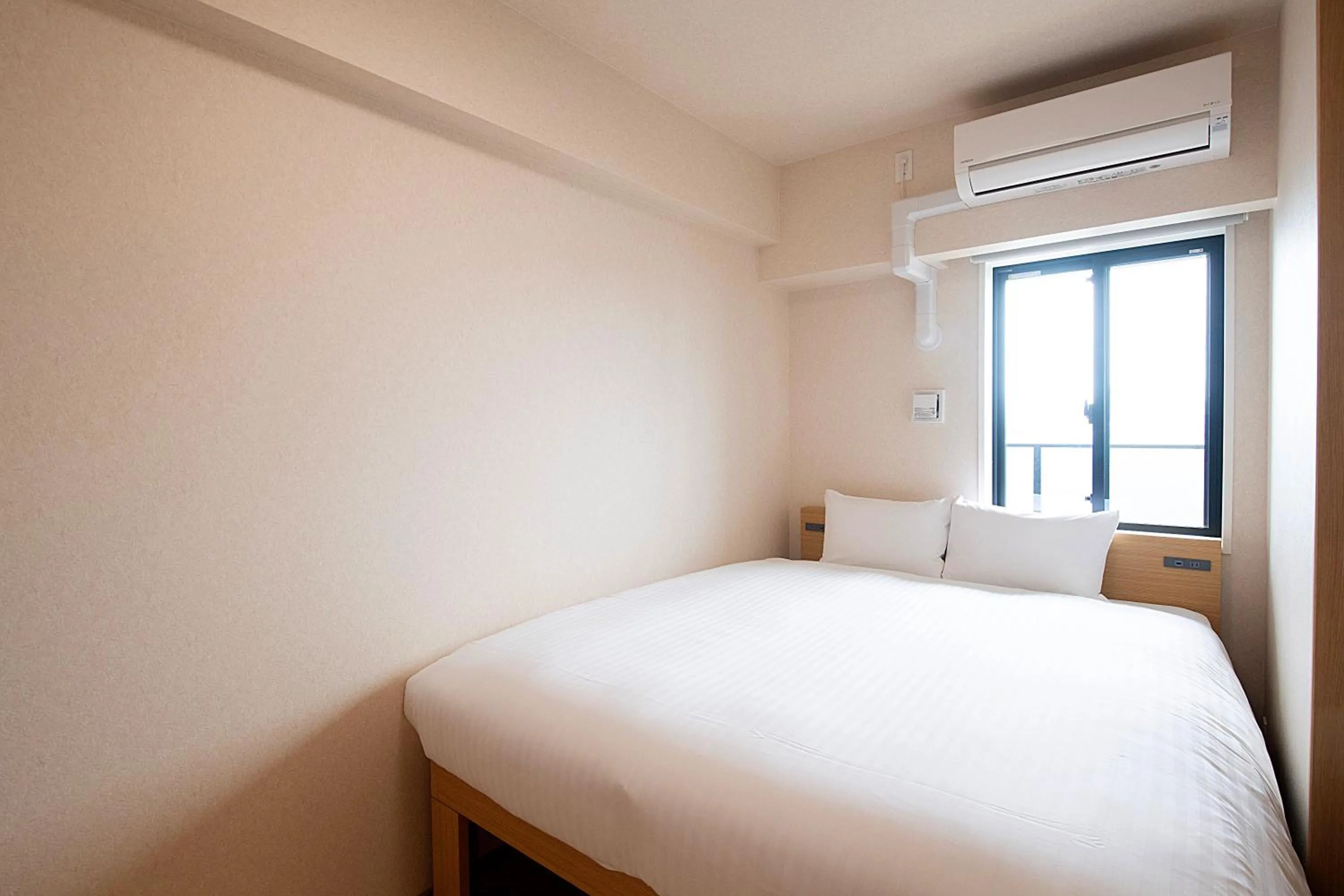 Bed in THE RISE Osaka Universal Bayside